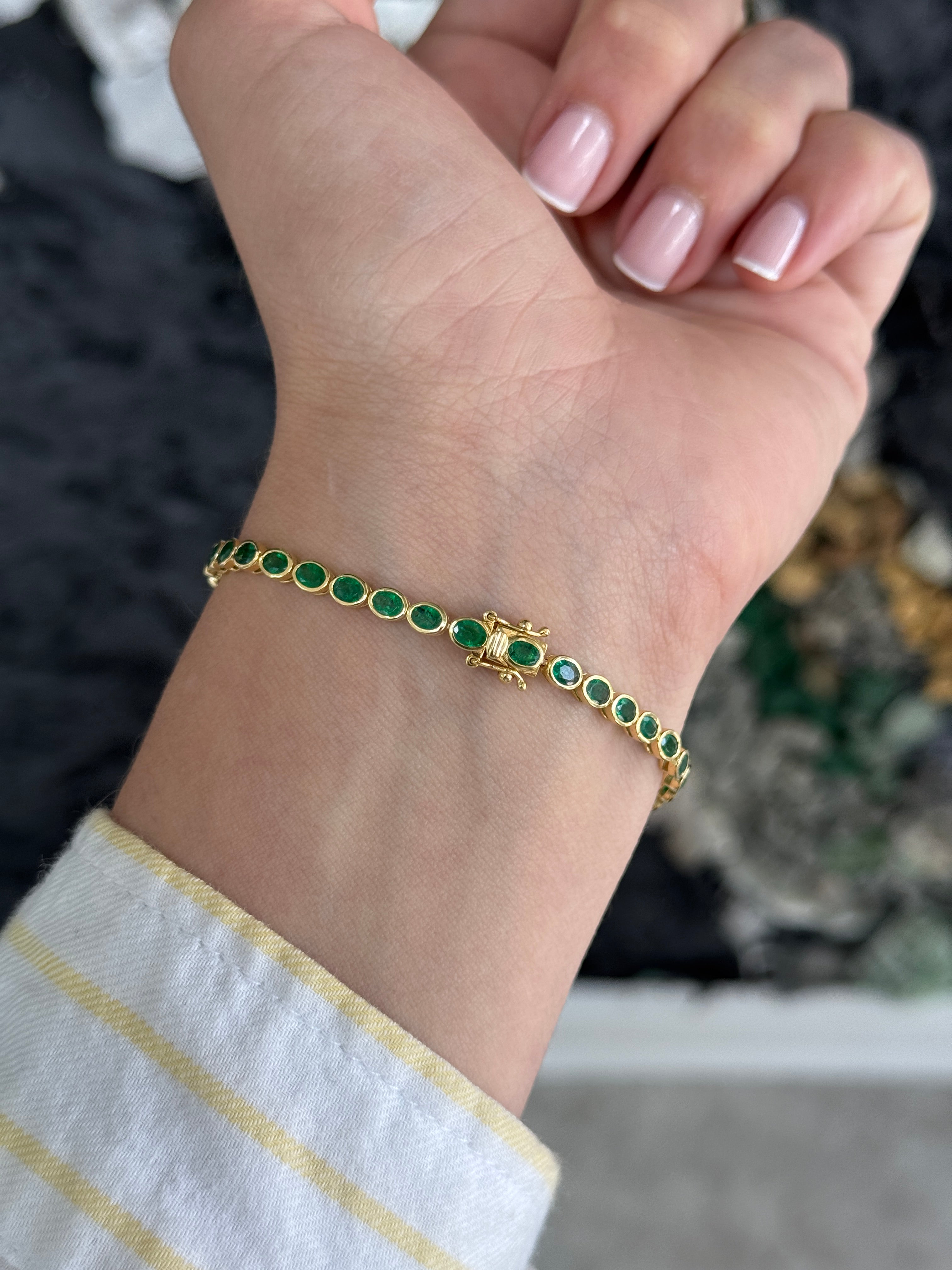 5.74tcw 14K East to West Natural Oval Cut Emerald Bezel Set Tennis Bracelet