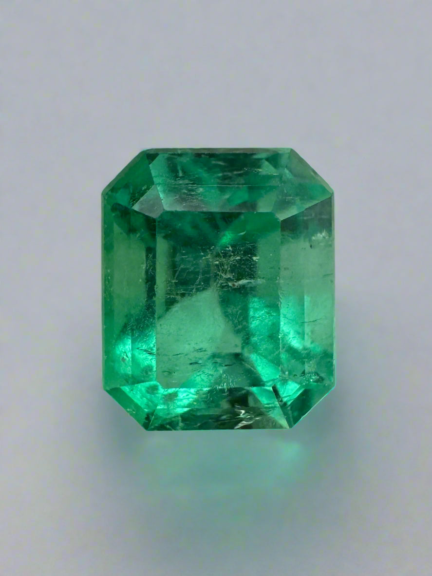 2.59 carat natural Colombian emerald yellowish green emerald cut loose gemstone
