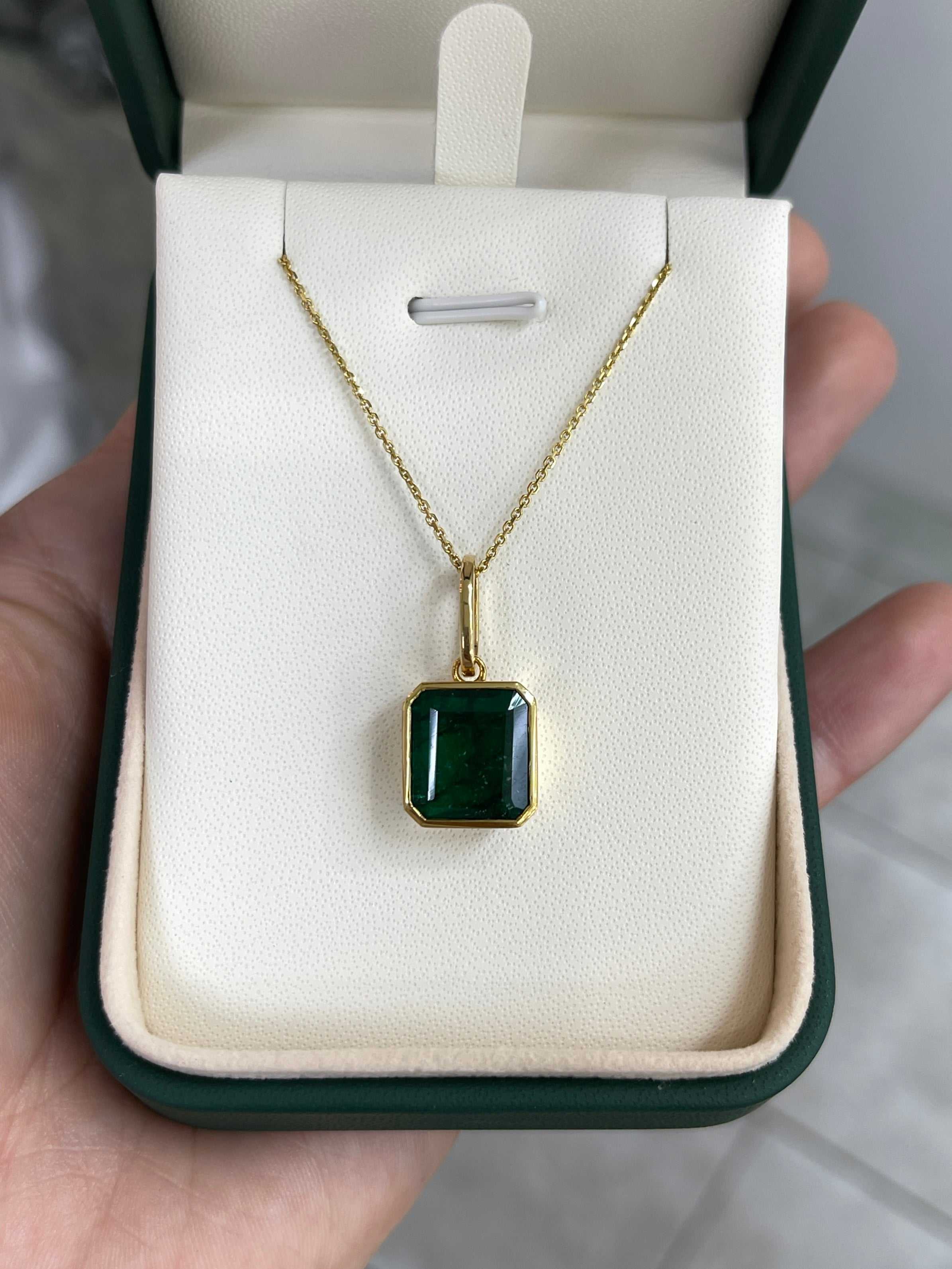 Dark green Zambian emerald necklace with 7.79 carats bezel set in 14K gold from JR Colombian Emeralds.
