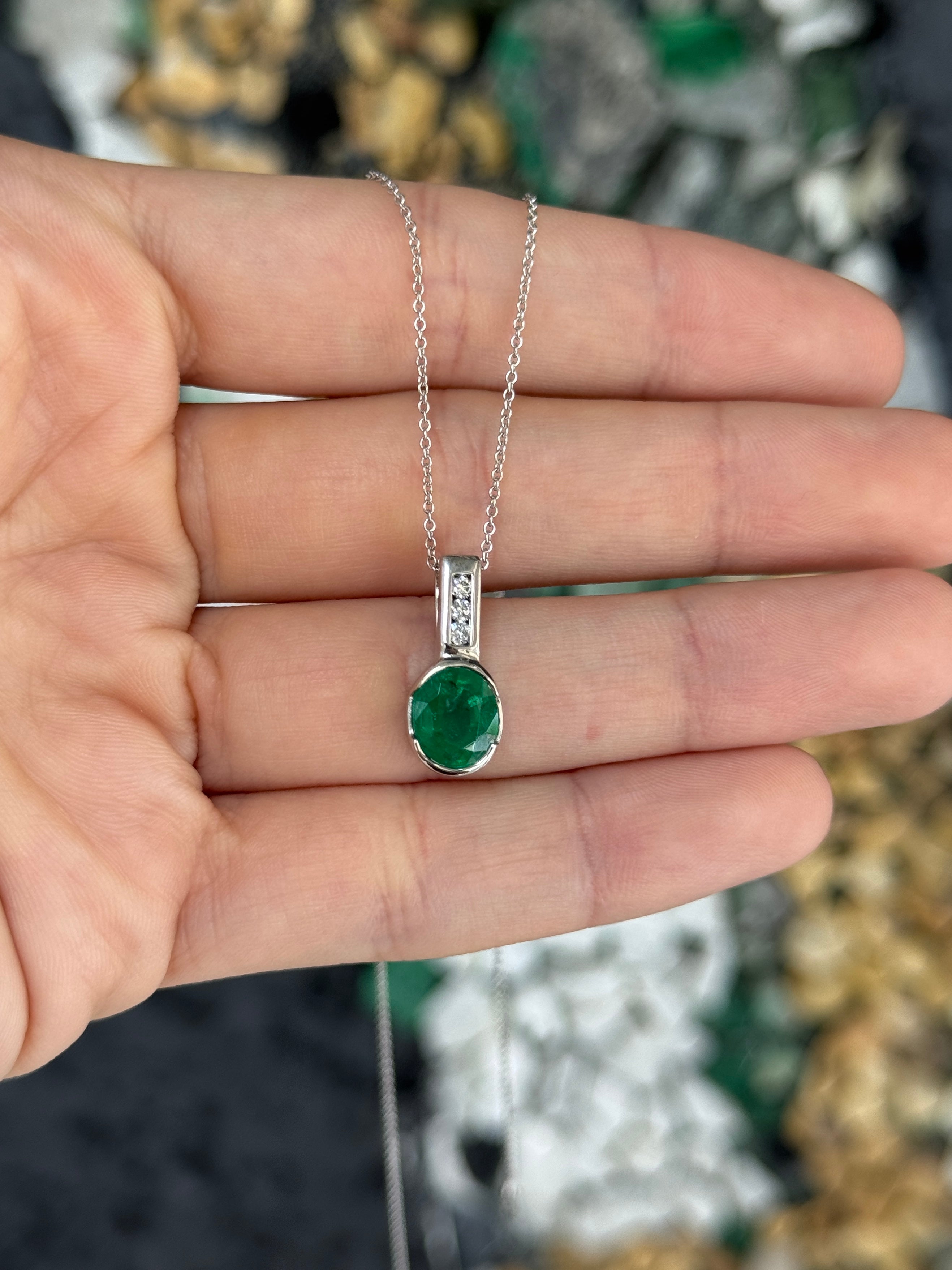 2.25tcw 14K Rich Oval Cut Emerald Half Bezel Set & Diamond Bale Accents
