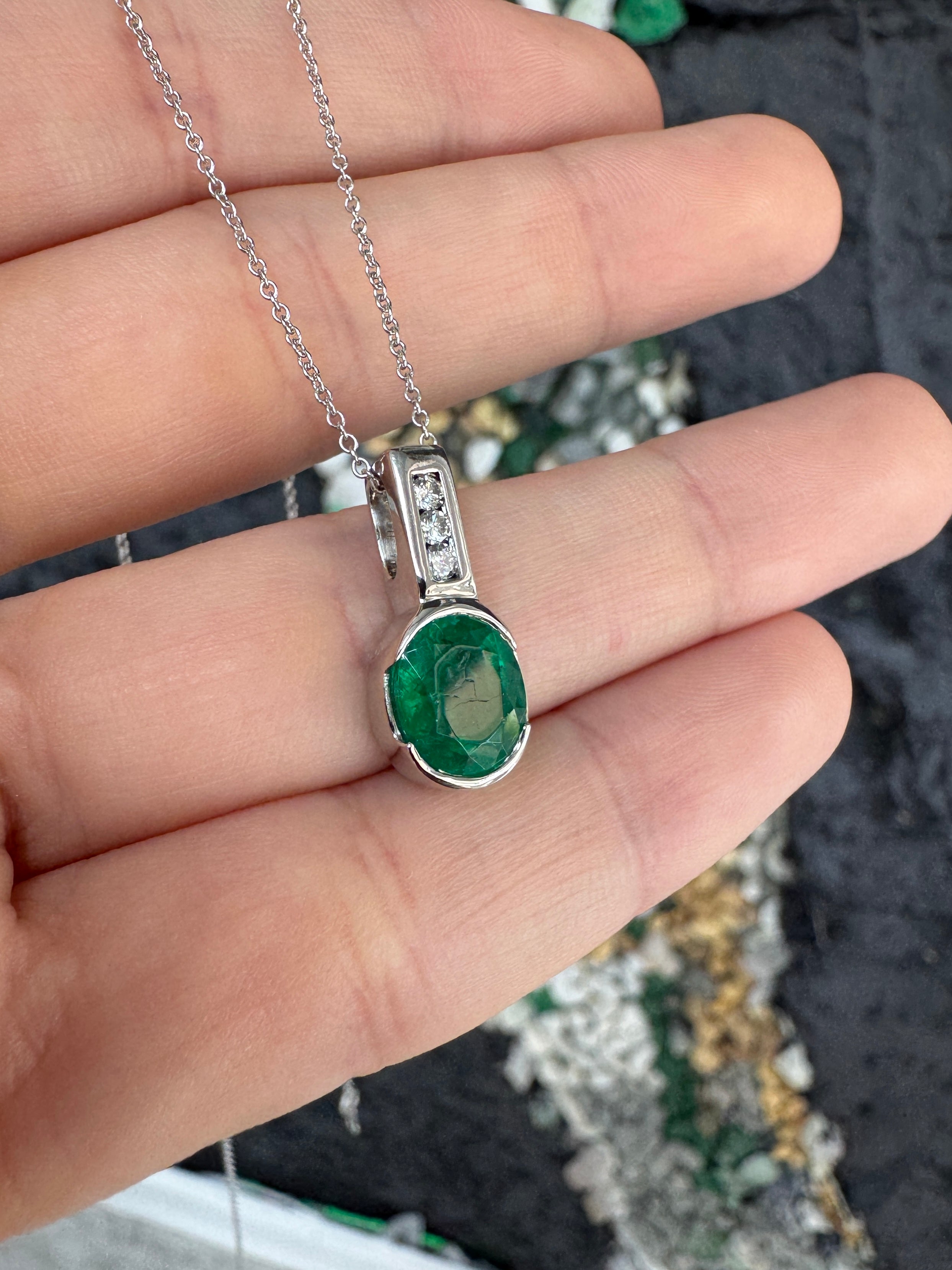 2.25tcw 14K Rich Oval Cut Emerald Half Bezel Set & Diamond Bale Accents
