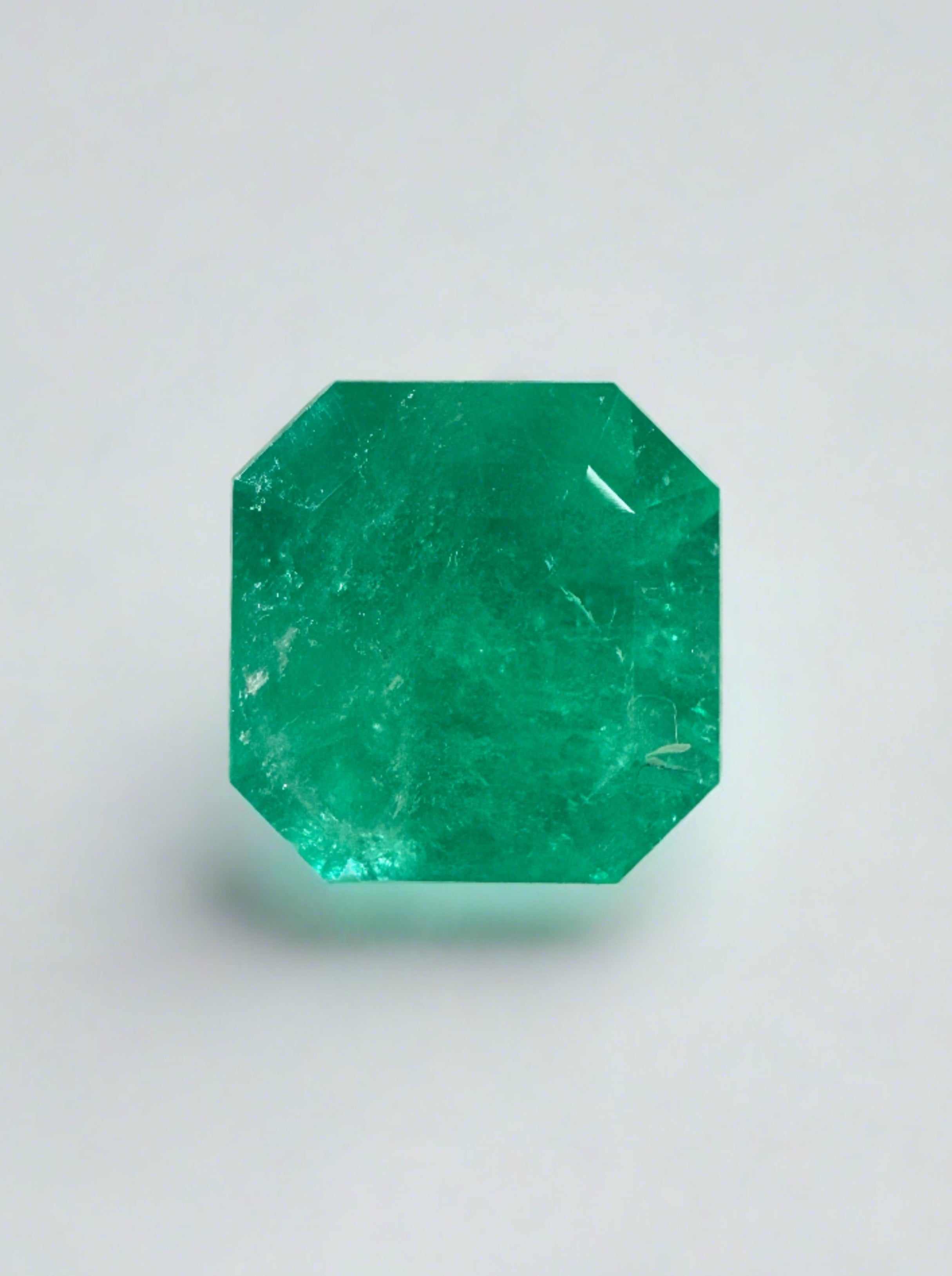 2.82 carat Asscher cut Colombian emerald, semi-transparent, vibrant medium green.