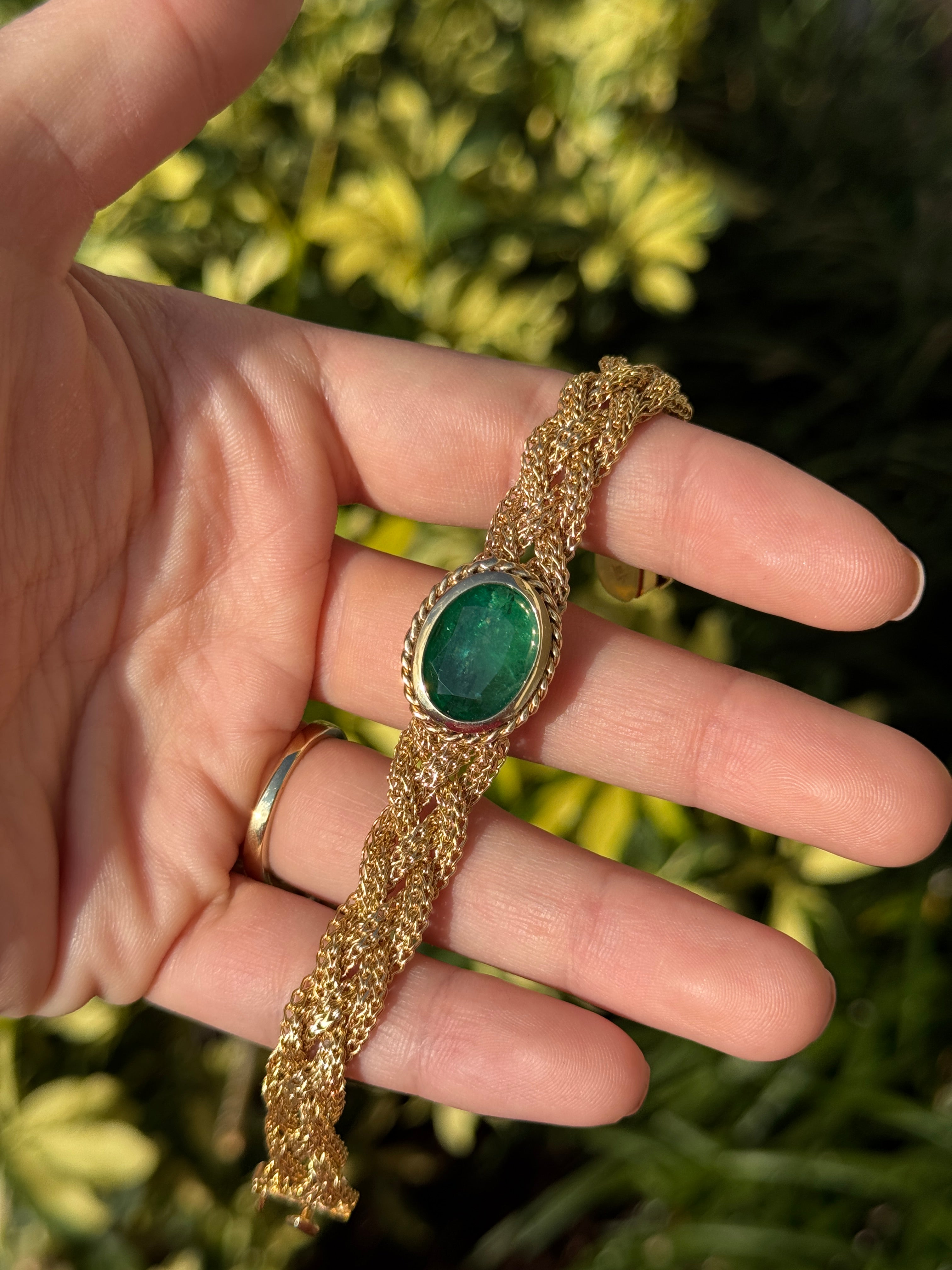 10.70 Carat Colombian Oval Emerald East West Bezel Bracelet In 14K Gold Vintage Revival Design