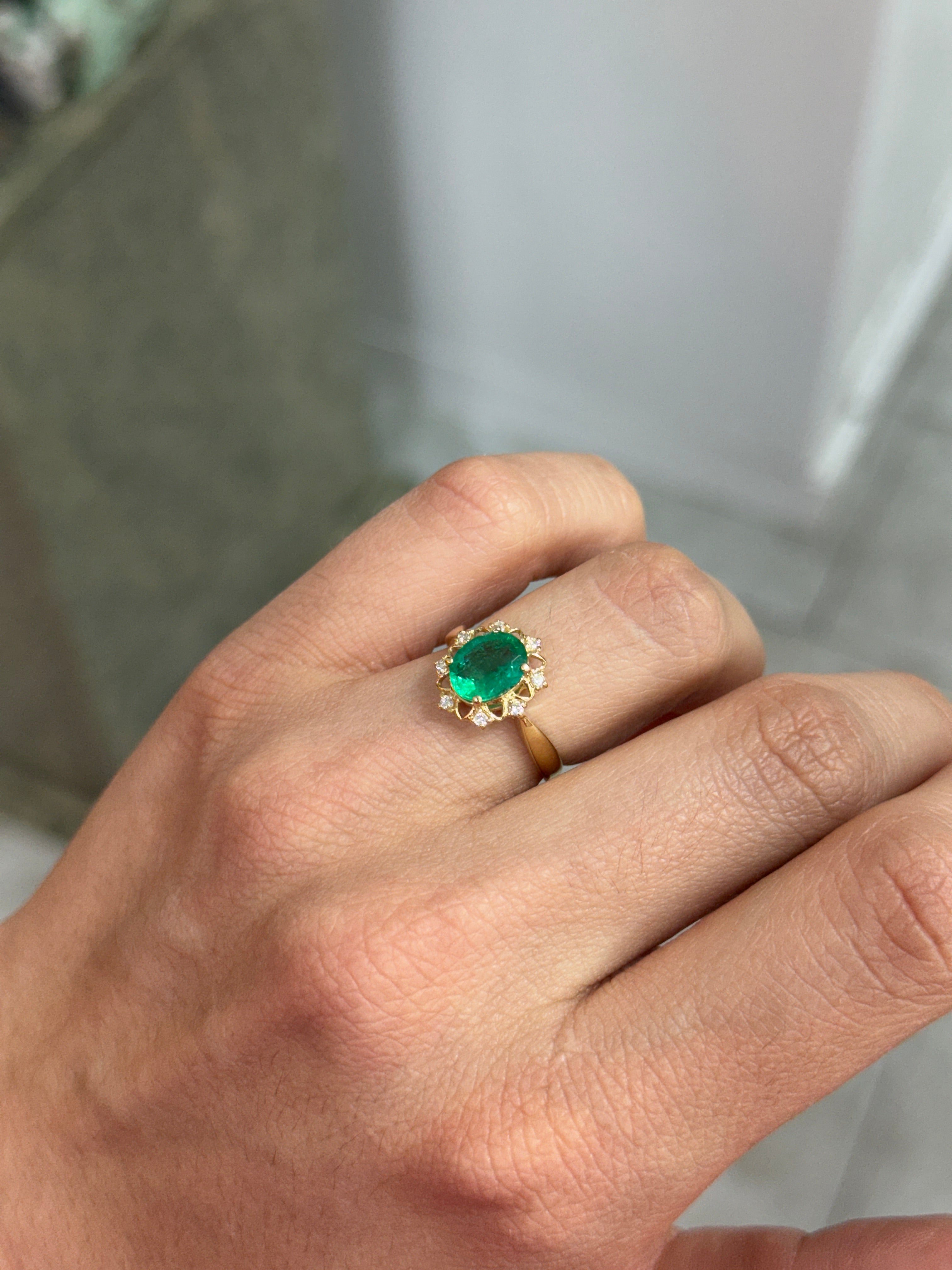 2.29tcw Emerald & Diamond Floral Halo Ring In 14K Yellow Gold Oval Cut Center