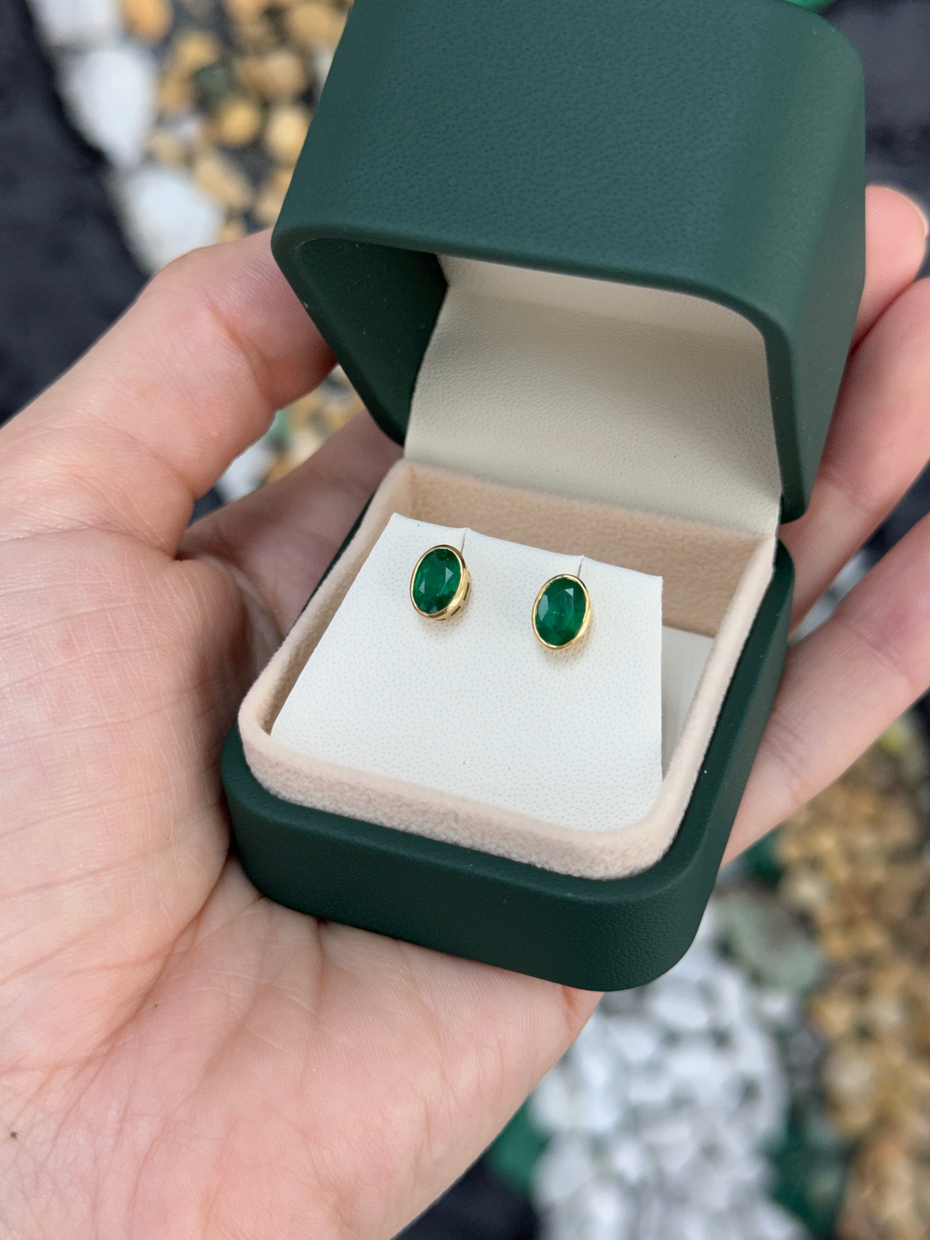 1.45tcw Vivid Green Oval Bezel Set Emerald Studs 18K