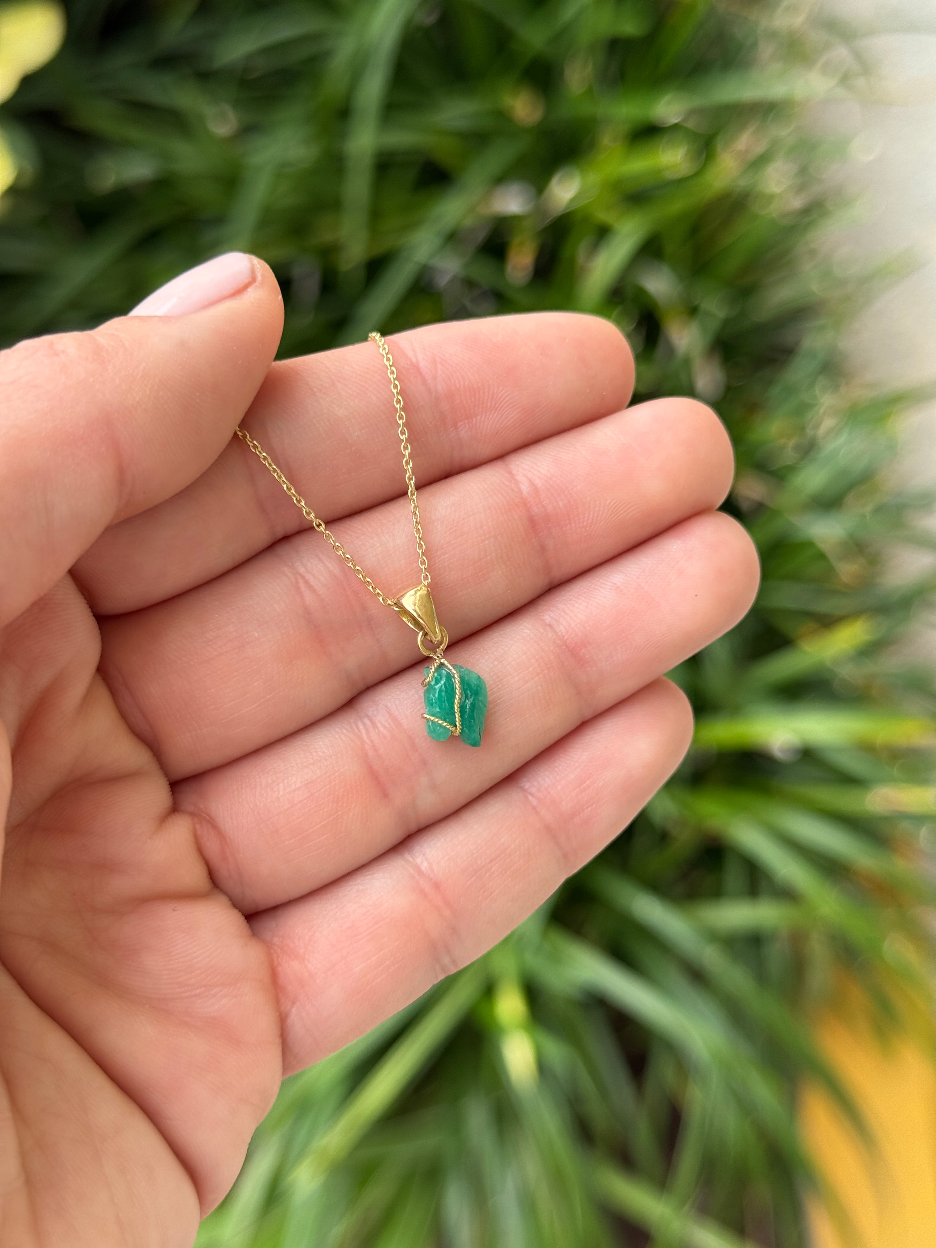 18K necklace featuring a 1.40 carat Chinese New Year horse Colombian emerald pendant by JR Colombian Emeralds.