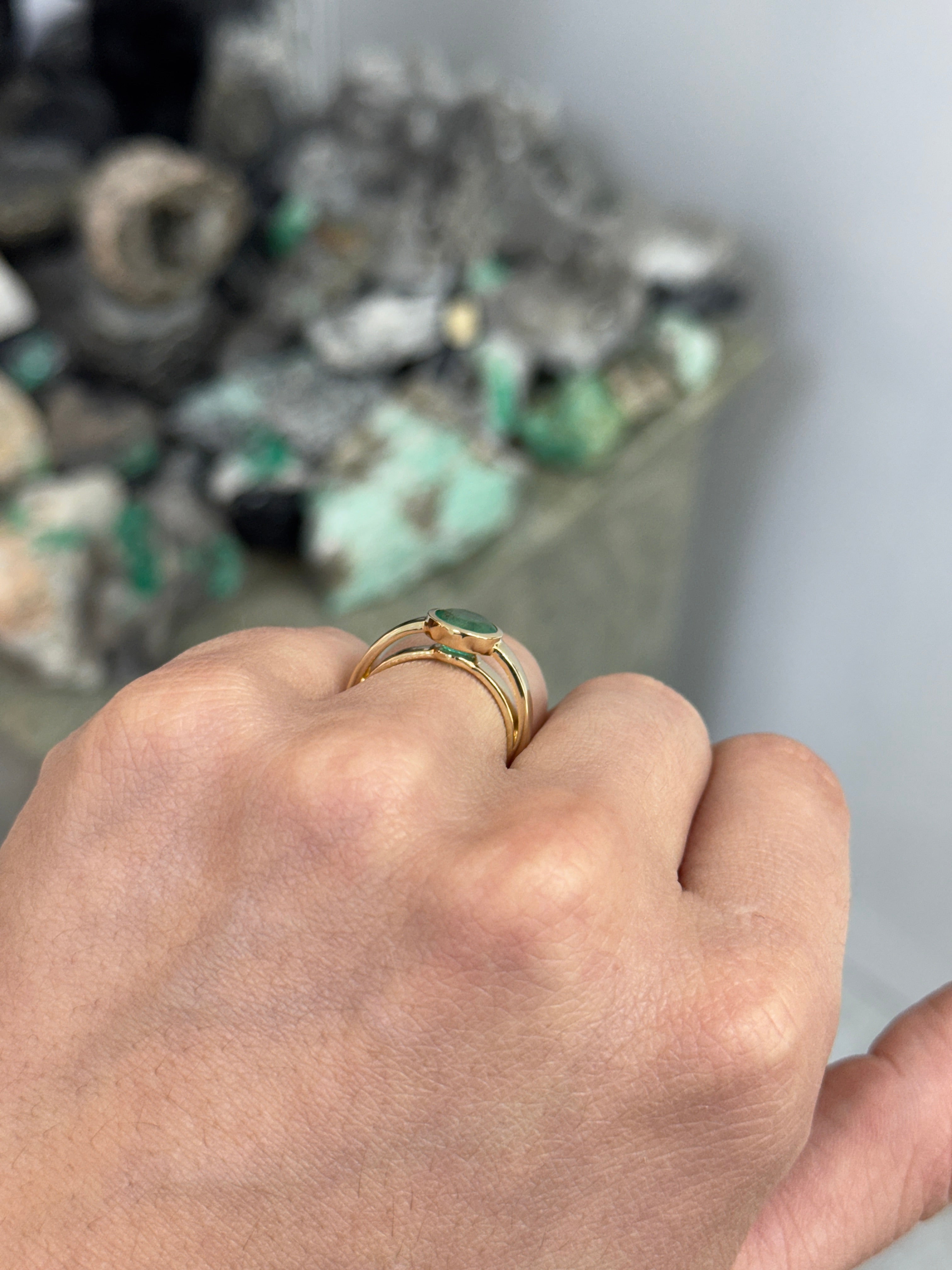 14K gold bezel set round emerald solitaire ring featuring a 1.73 carat Colombian emerald by JR Colombian Emeralds.