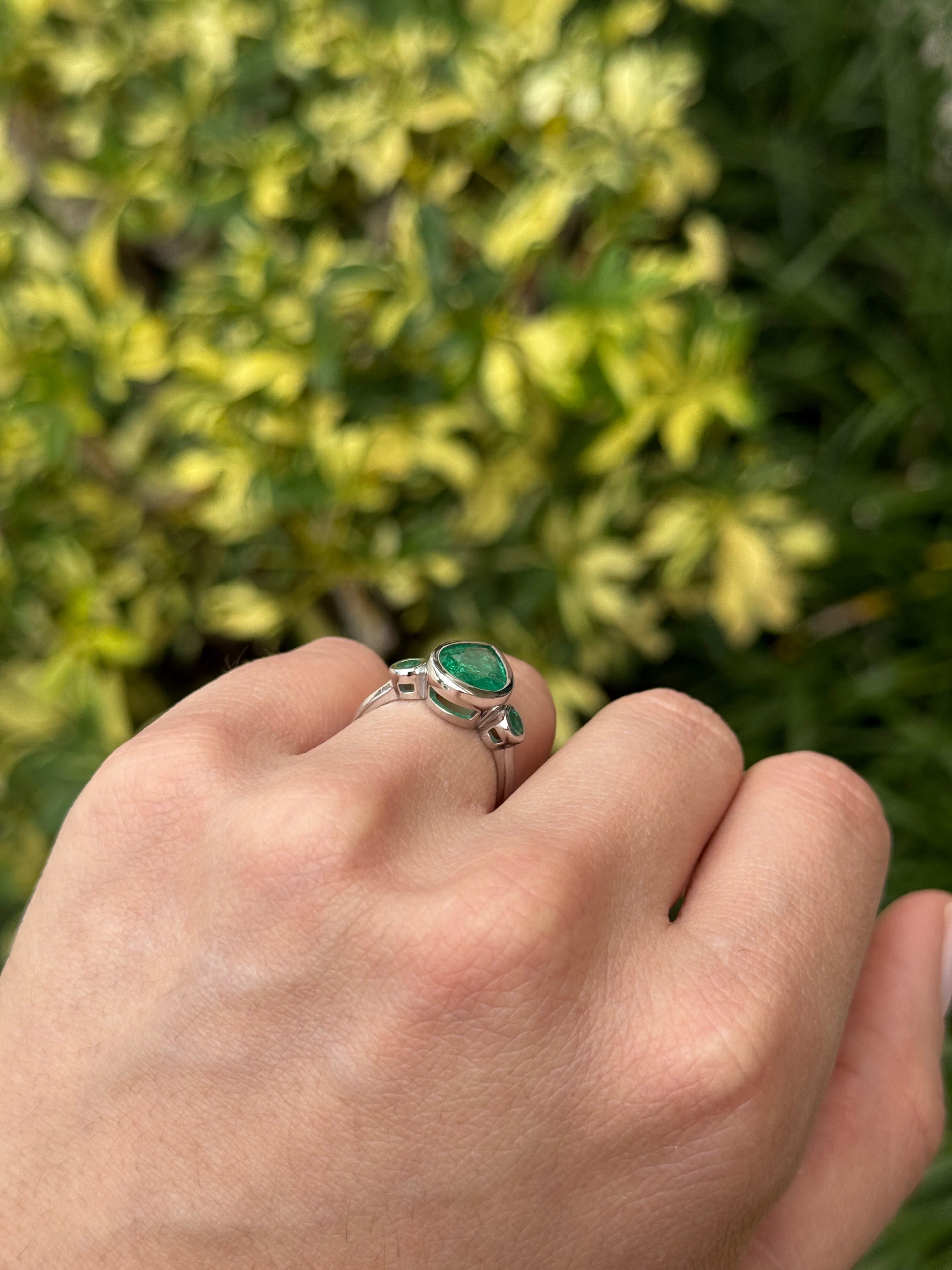 14K white gold engagement ring with 2.30tcw emerald three-stone design featuring pear and round cut gemstones by JR Colombian Emeralds
