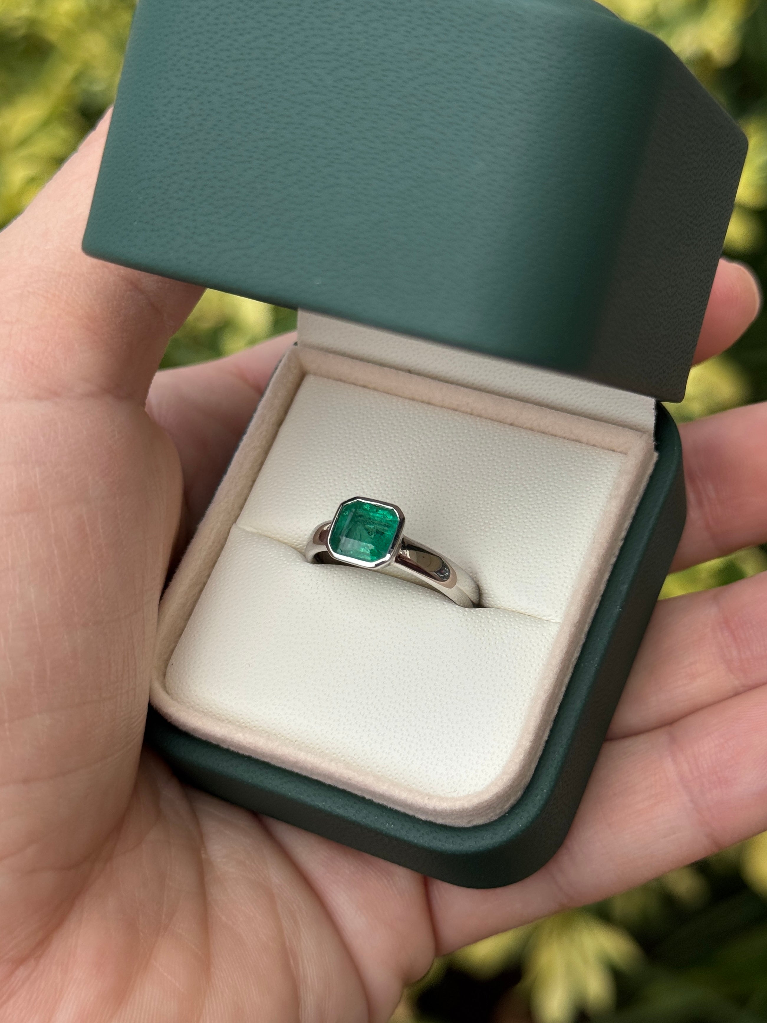 Asscher cut emerald diamond solitaire ring with 1.32 carats in 14K white gold bezel setting by JR Colombian Emeralds.
