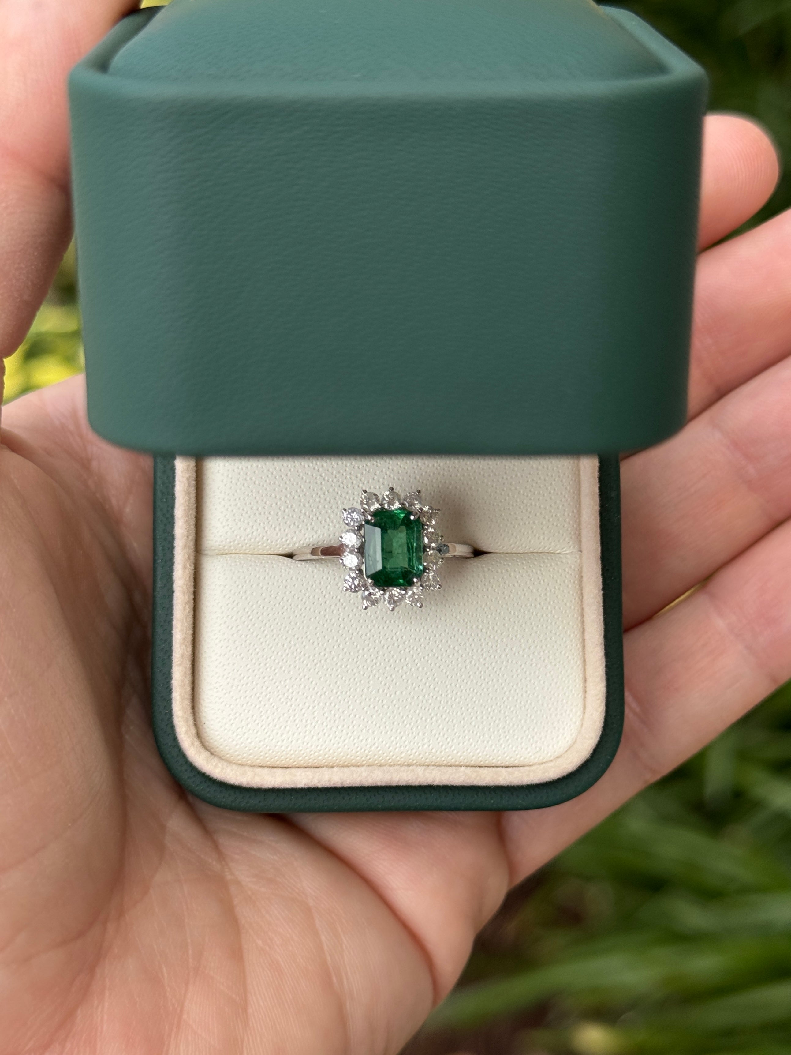 1.89tcw Princess Diana emerald cut Zambian emerald ring with round diamond halo in 14K white gold by JR Colombian Emeralds.