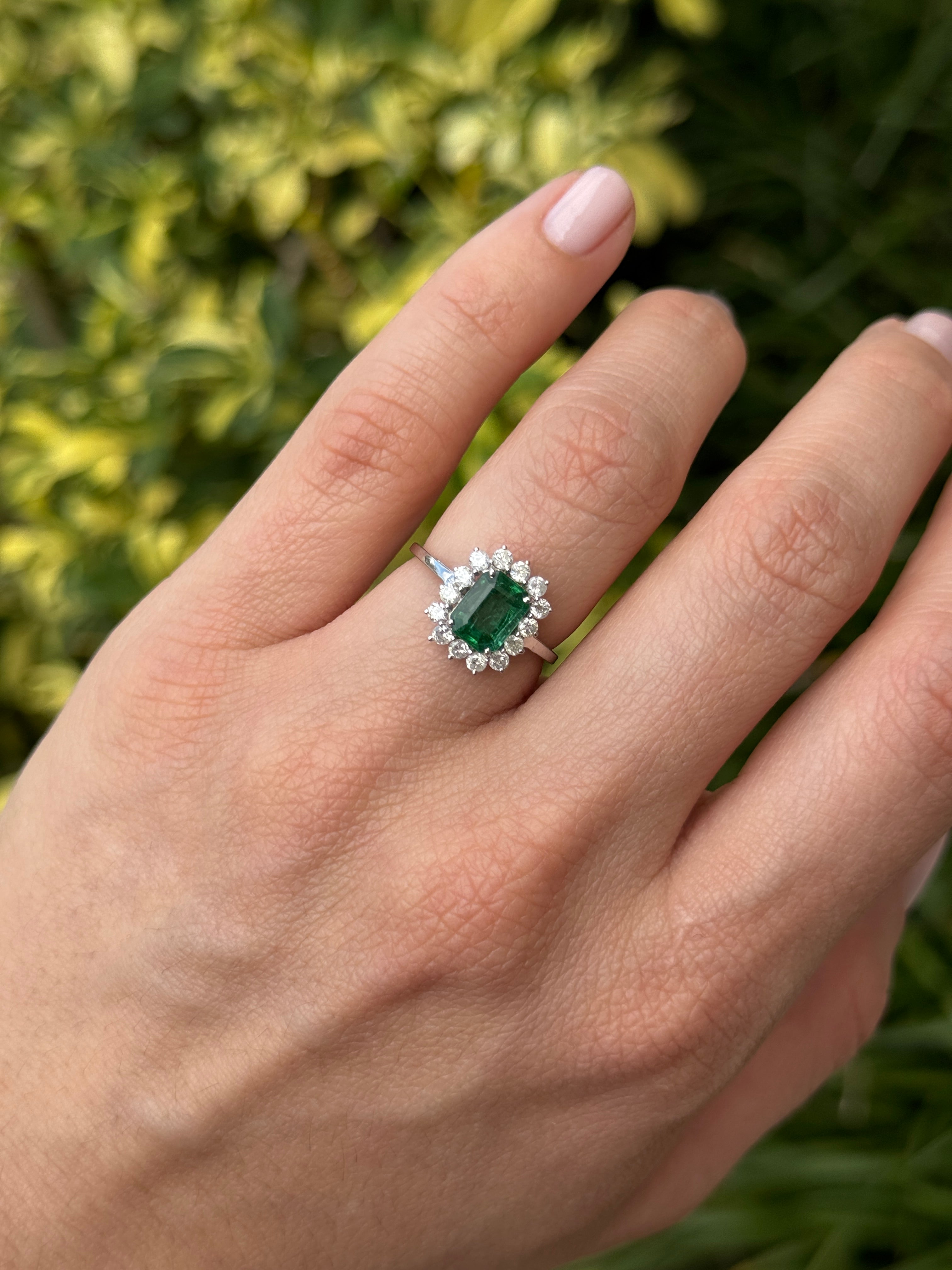 14K white gold princess Diana emerald cut Zambian emerald and round diamond halo ring featuring 1.89 carats, by JR Colombian Emeralds