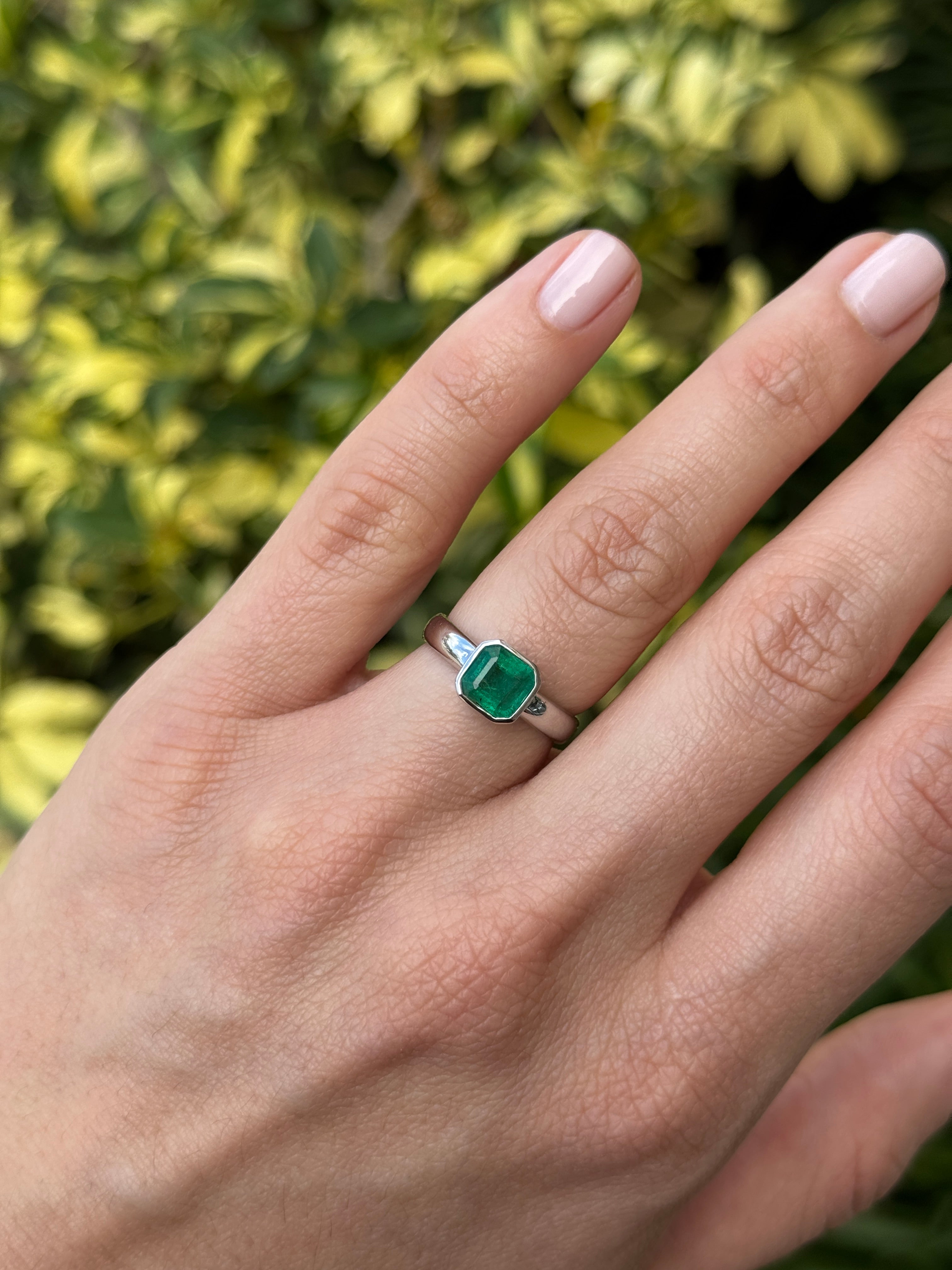 Asscher cut emerald diamond solitaire in 14K white gold bezel setting, 1.32 carats, by JR Colombian Emeralds.