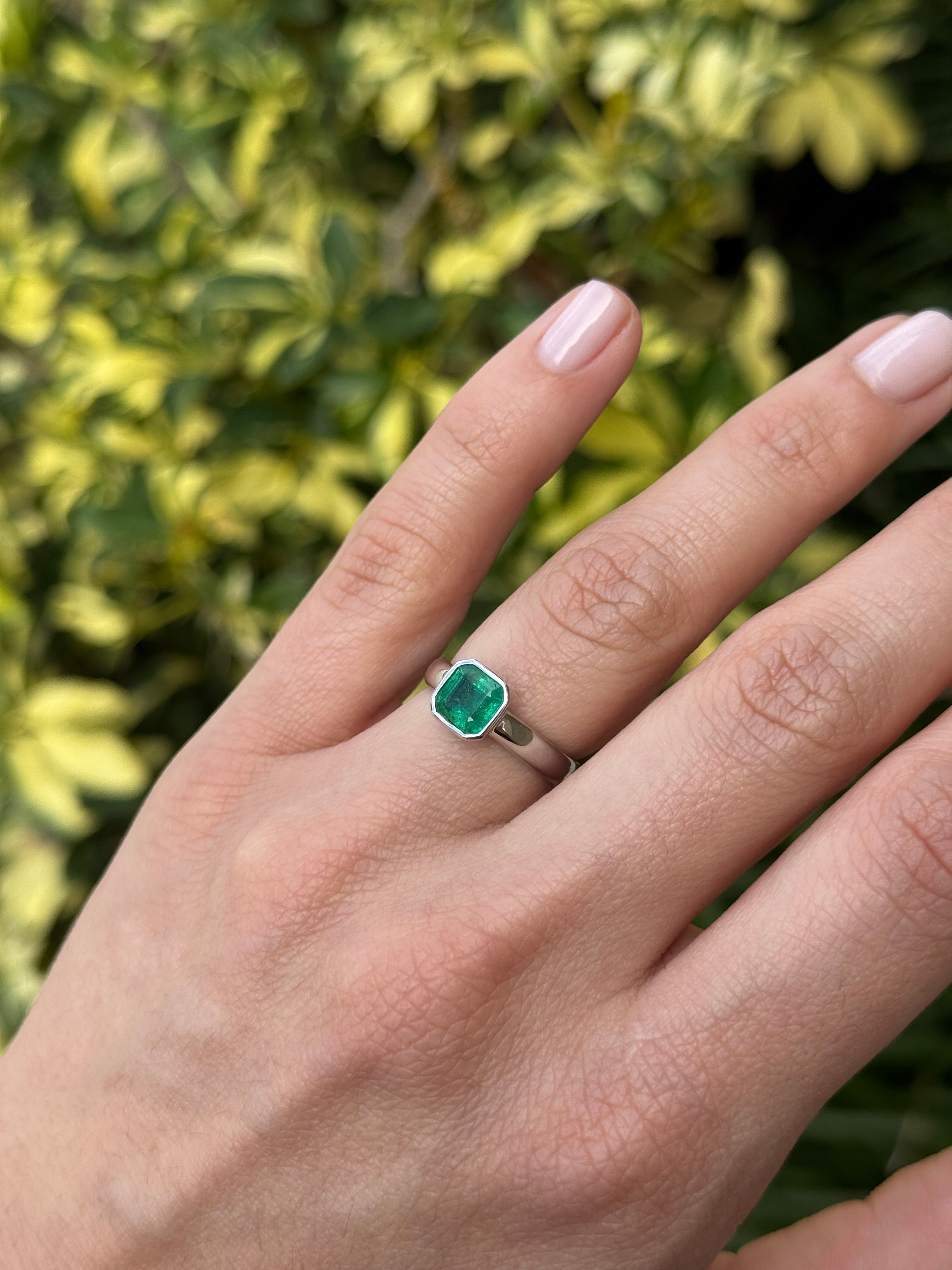 1.32 carat Asscher cut emerald diamond solitaire ring in 14K white gold with bezel setting by JR Colombian Emeralds.