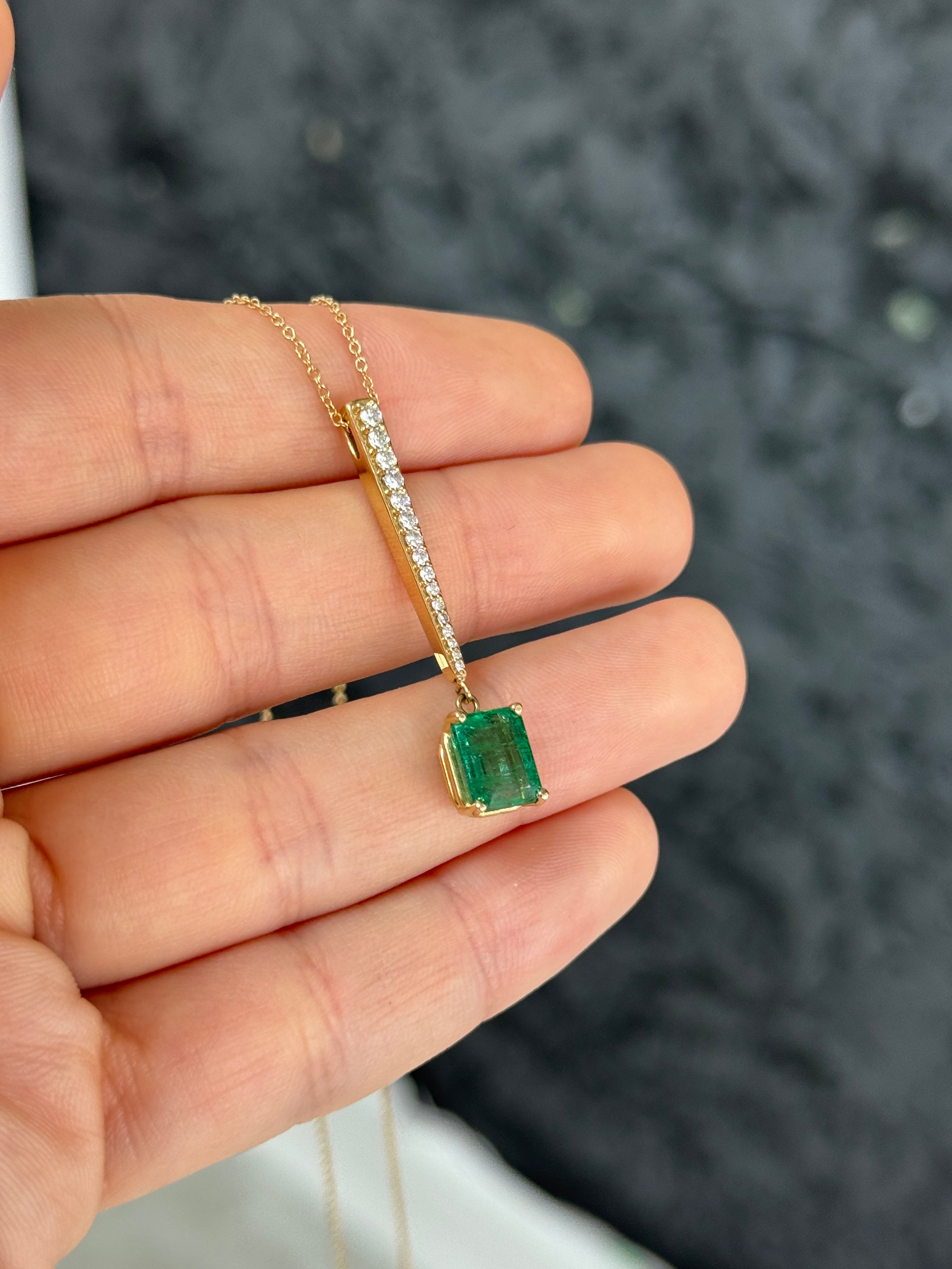 14K gold emerald and diamond V drop pendant necklace featuring 2.68tcw natural emerald cut emerald and diamond accents by JR Colombian Emeralds