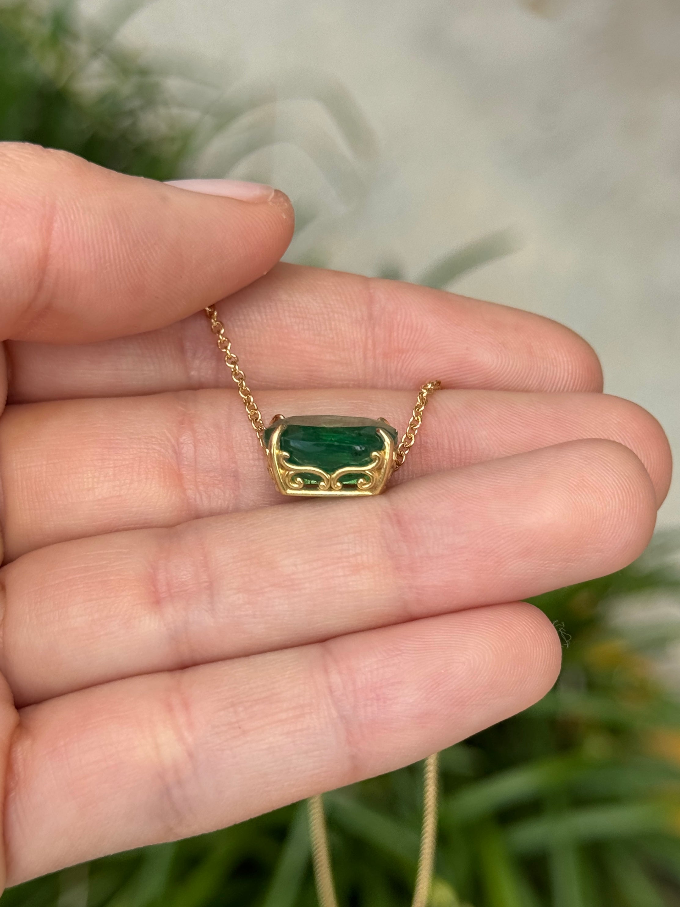 18K yellow gold emerald necklace with a 6.80ct oval Colombian emerald in a fleur-de-lis station design by JR Colombian Emeralds