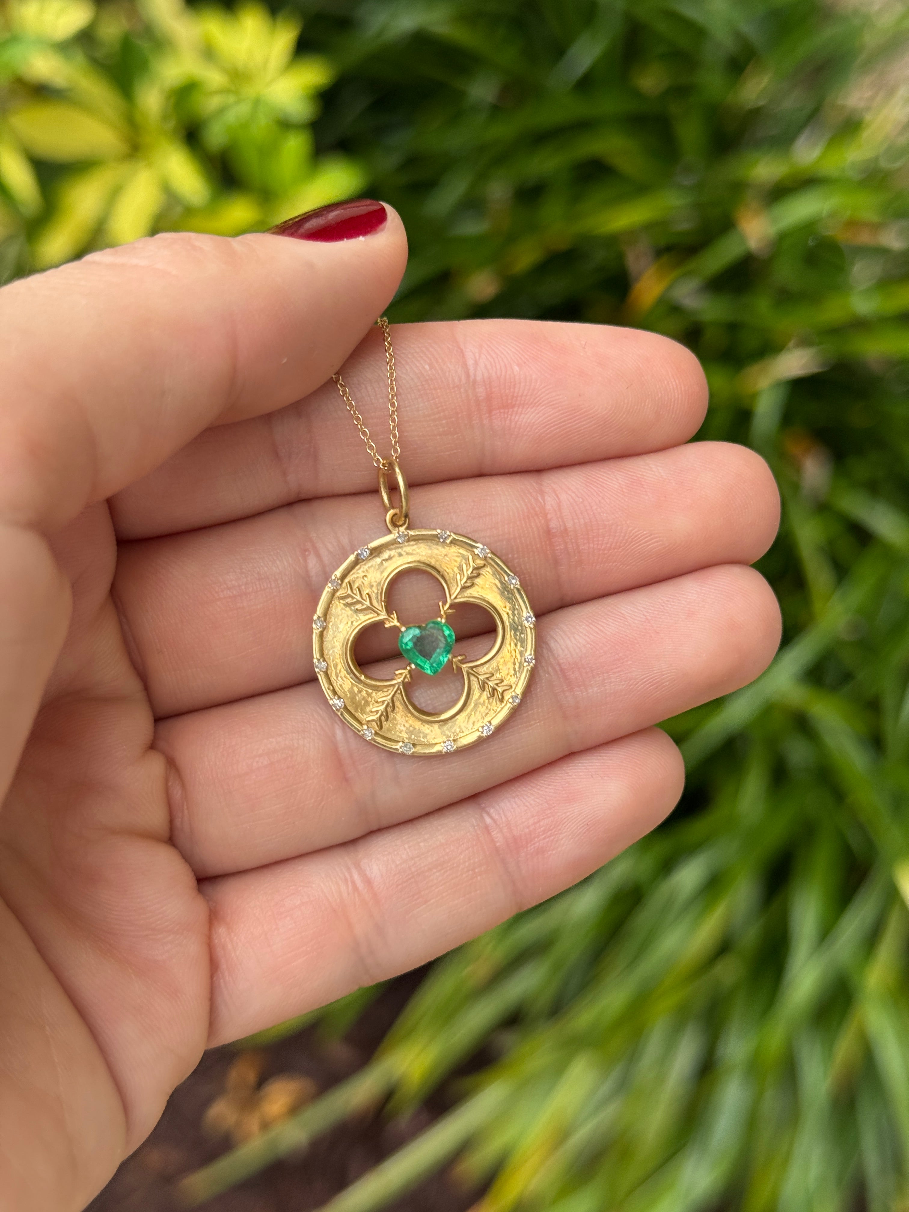 14K gold medallion pendant with 0.86tcw heart-cut emerald and diamond accents by JR Colombian Emeralds.