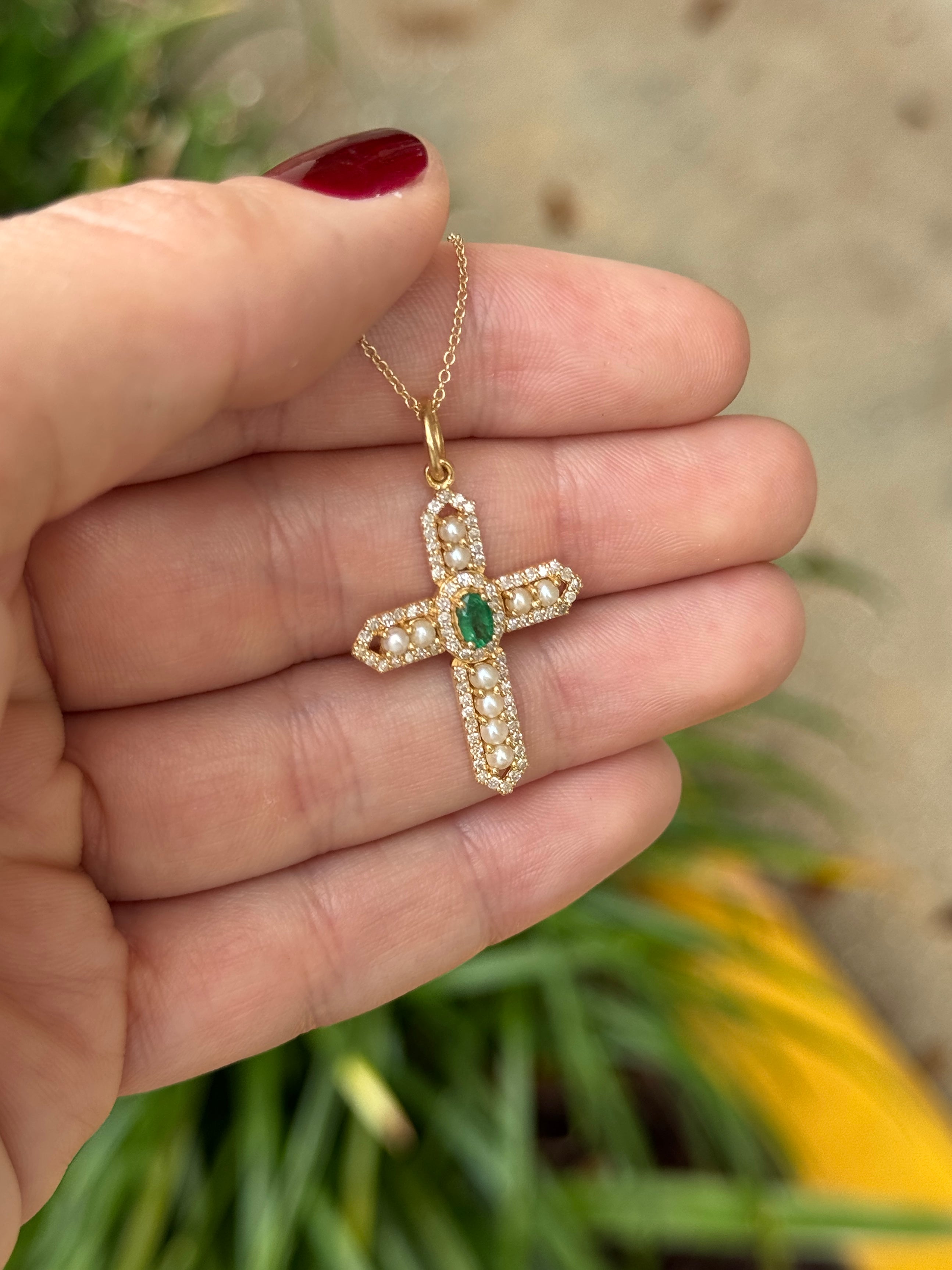 14K gold Regal cross pendant featuring natural emeralds, diamonds, and pearls from JR Colombian Emeralds.