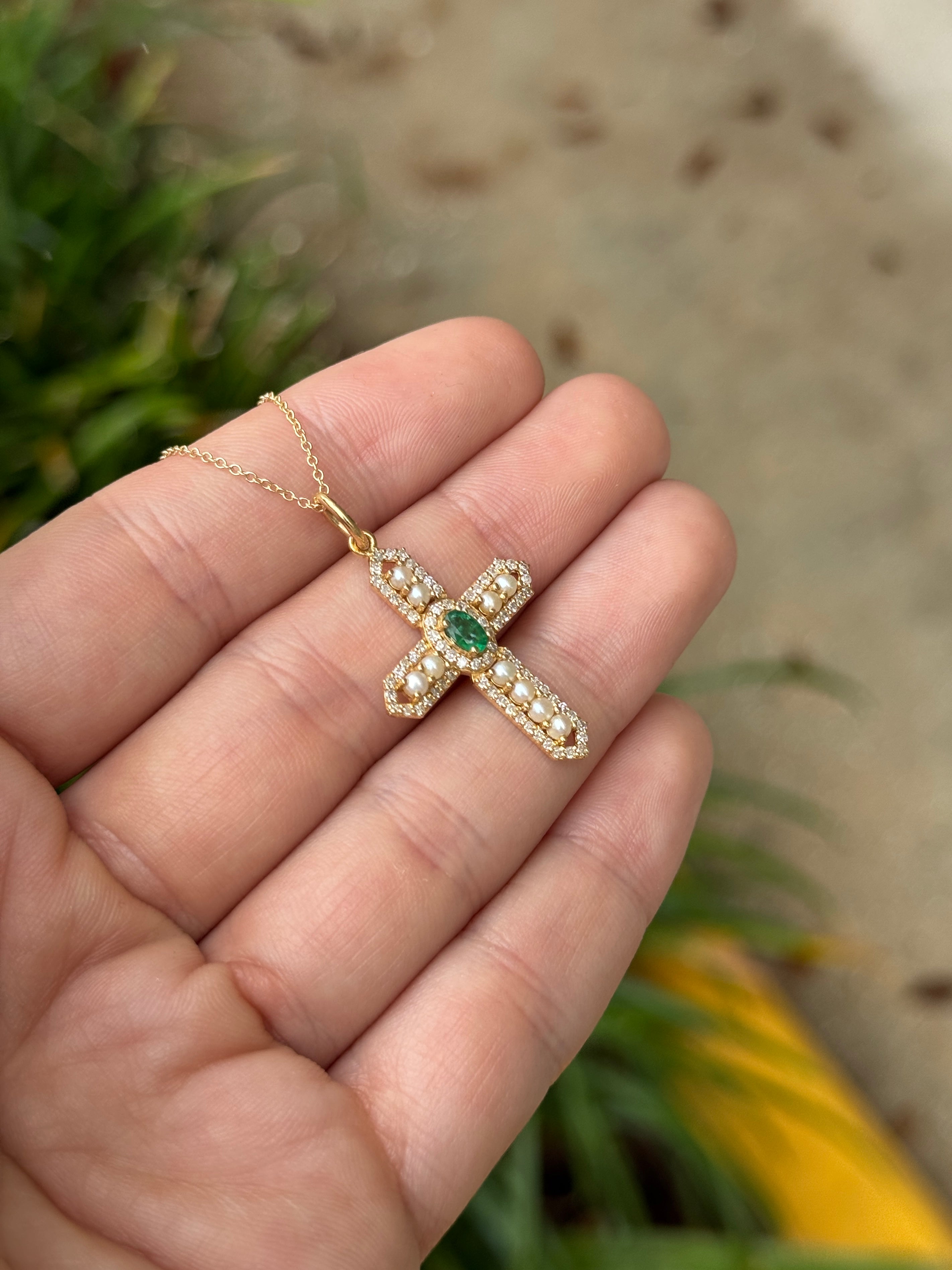 14K gold cross pendant with 1.54tcw natural emerald, diamonds, and pearl accents by JR Colombian Emeralds.