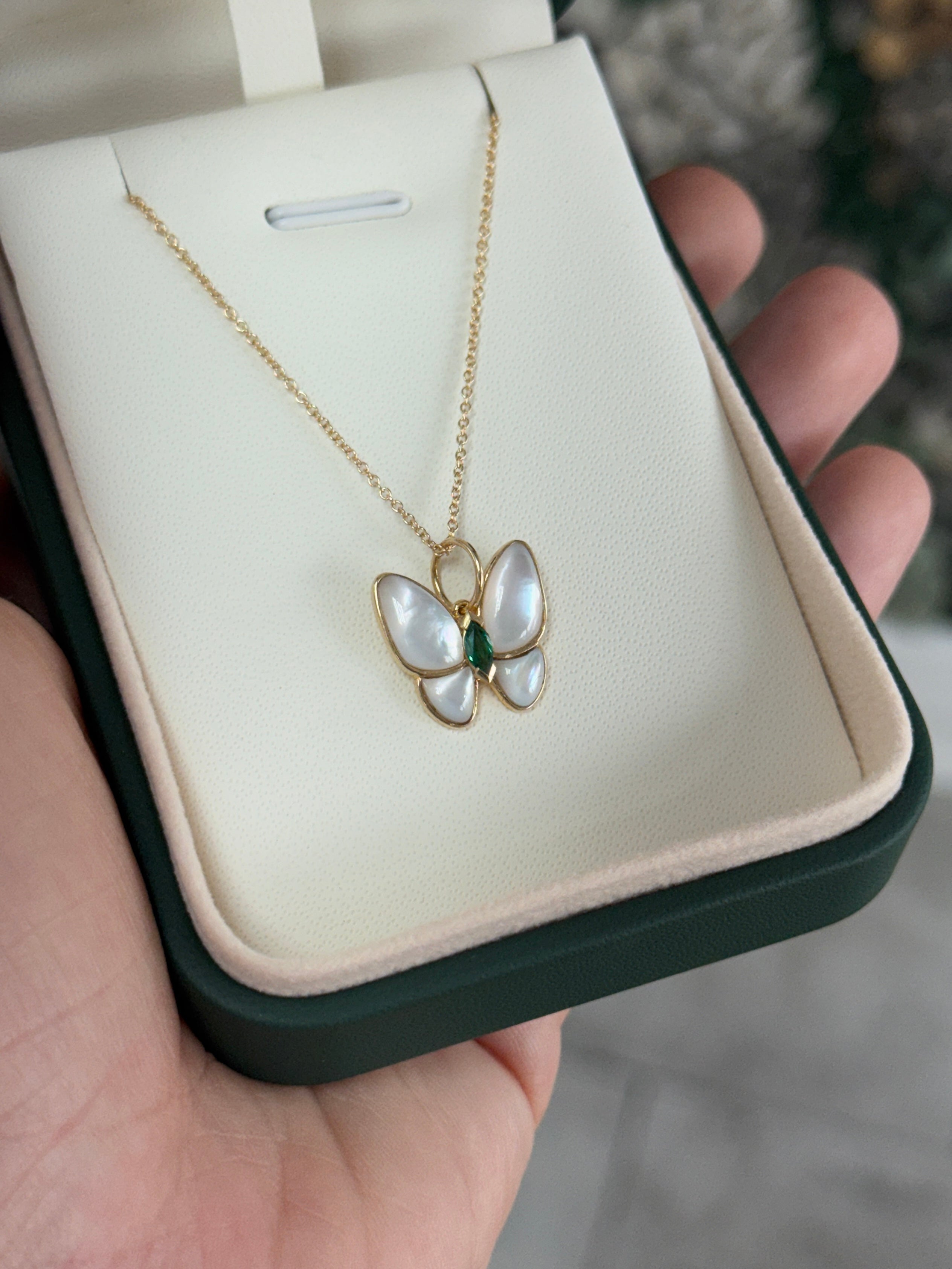 14K natural marquise emerald and mother of pearl butterfly pendant with 2.90tcw from JR Colombian Emeralds.