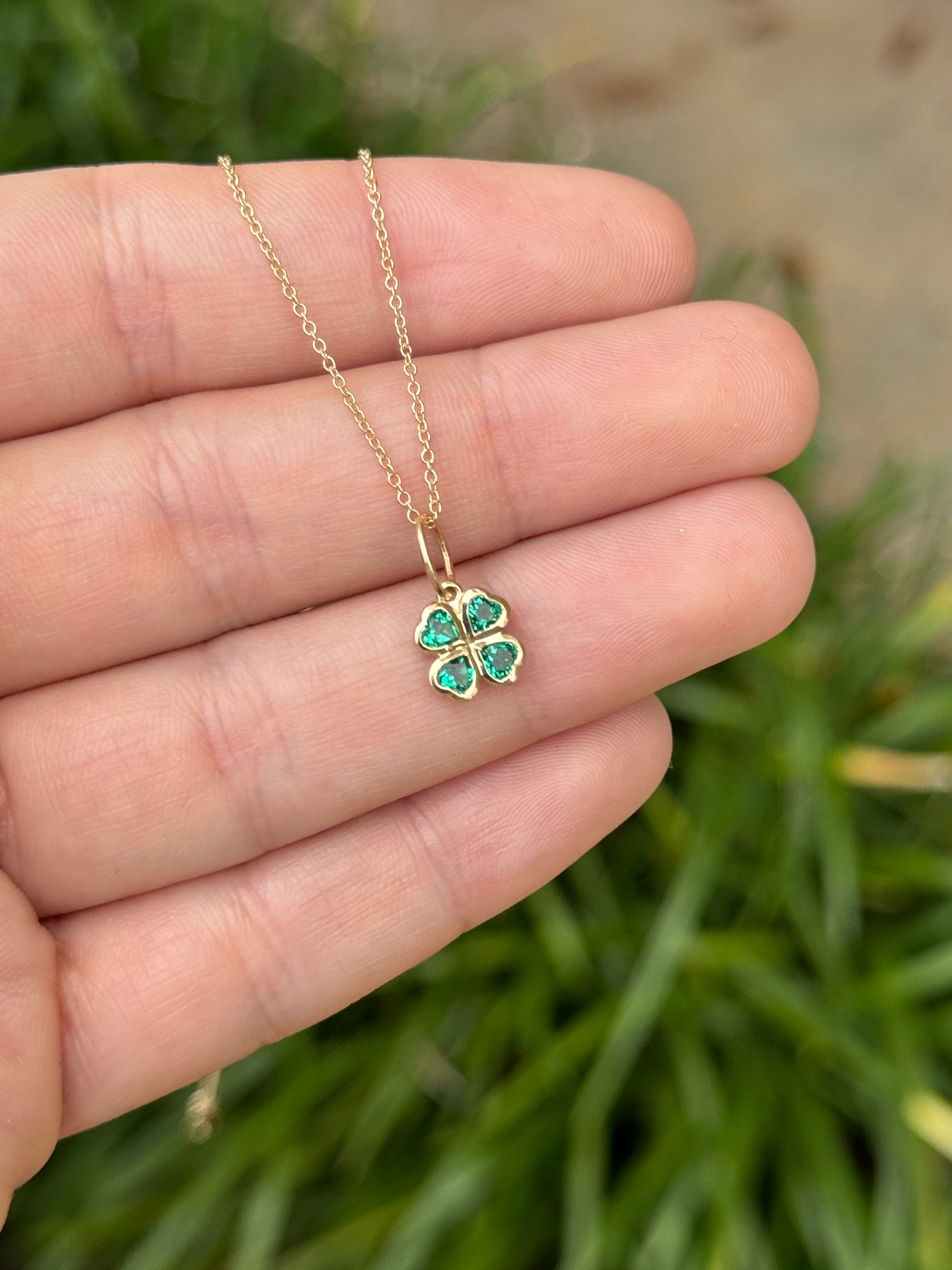 14K gold heart-shaped emerald clover charm pendant with 0.44tcw AAA+ quality gemstones, designed by JR Colombian Emeralds.