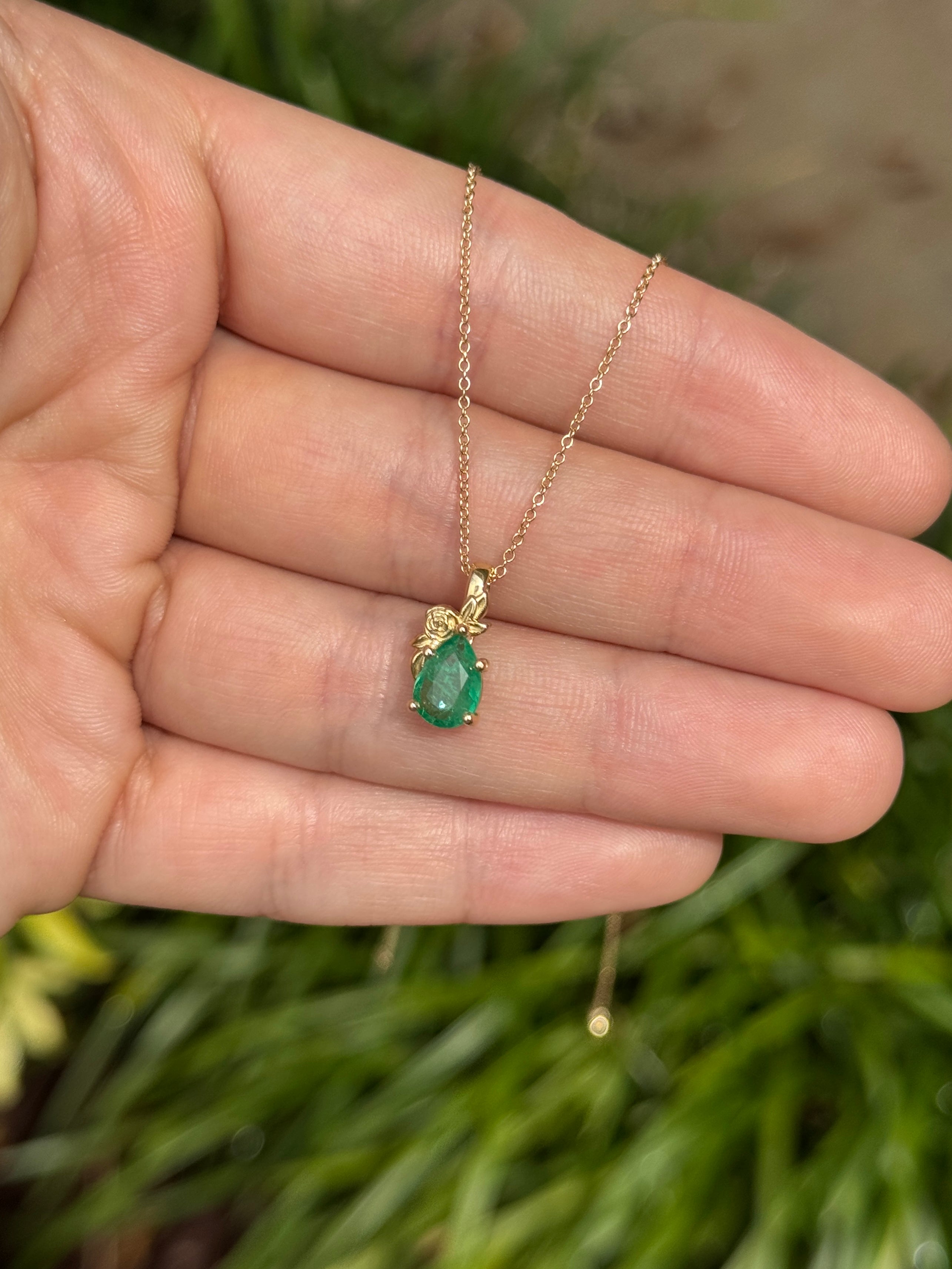 14K natural medium green pear cut emerald pendant necklace with floral solitaire setting, by JR Colombian Emeralds.