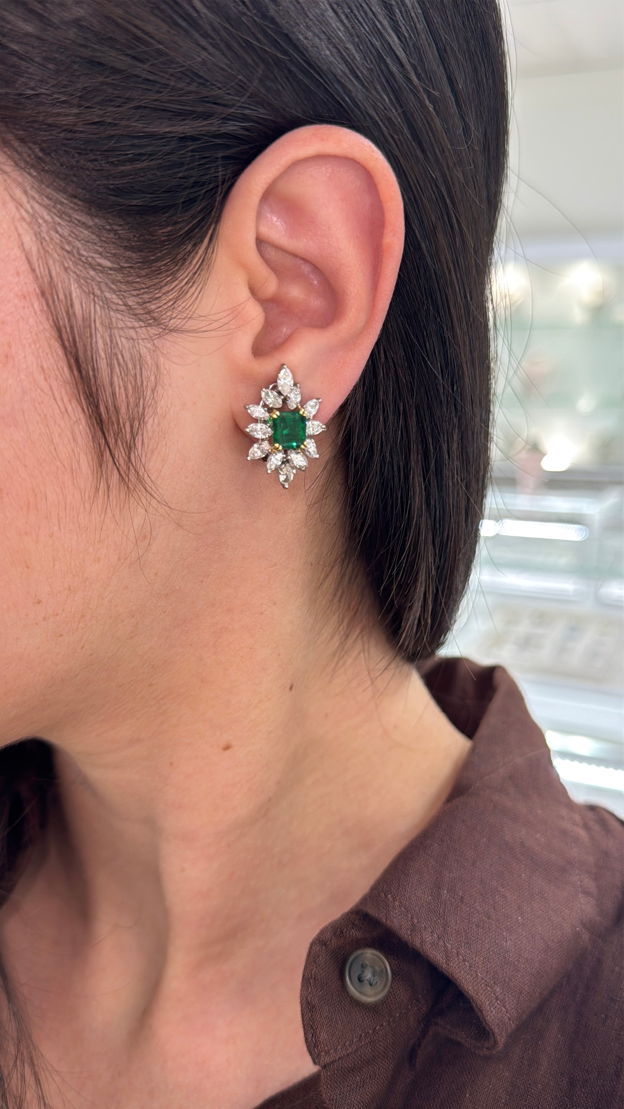 18K gold cocktail earrings featuring 7.92 carats of rich emeralds and diamonds in a starburst design by JR Colombian Emeralds.
