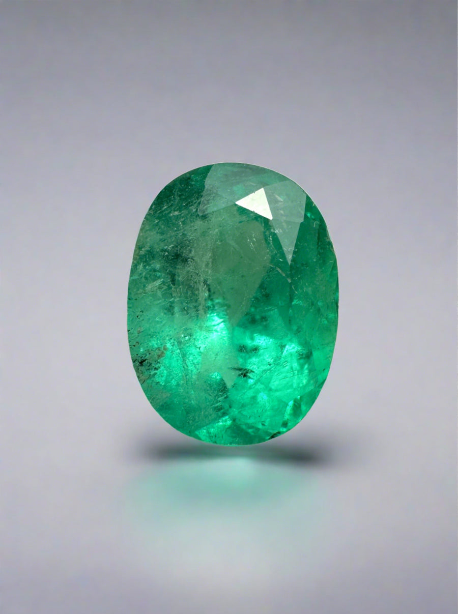 1.74 Carat 9x7 Freckled Bluish Green Natural Loose Colombian Emerald-Oval Cut