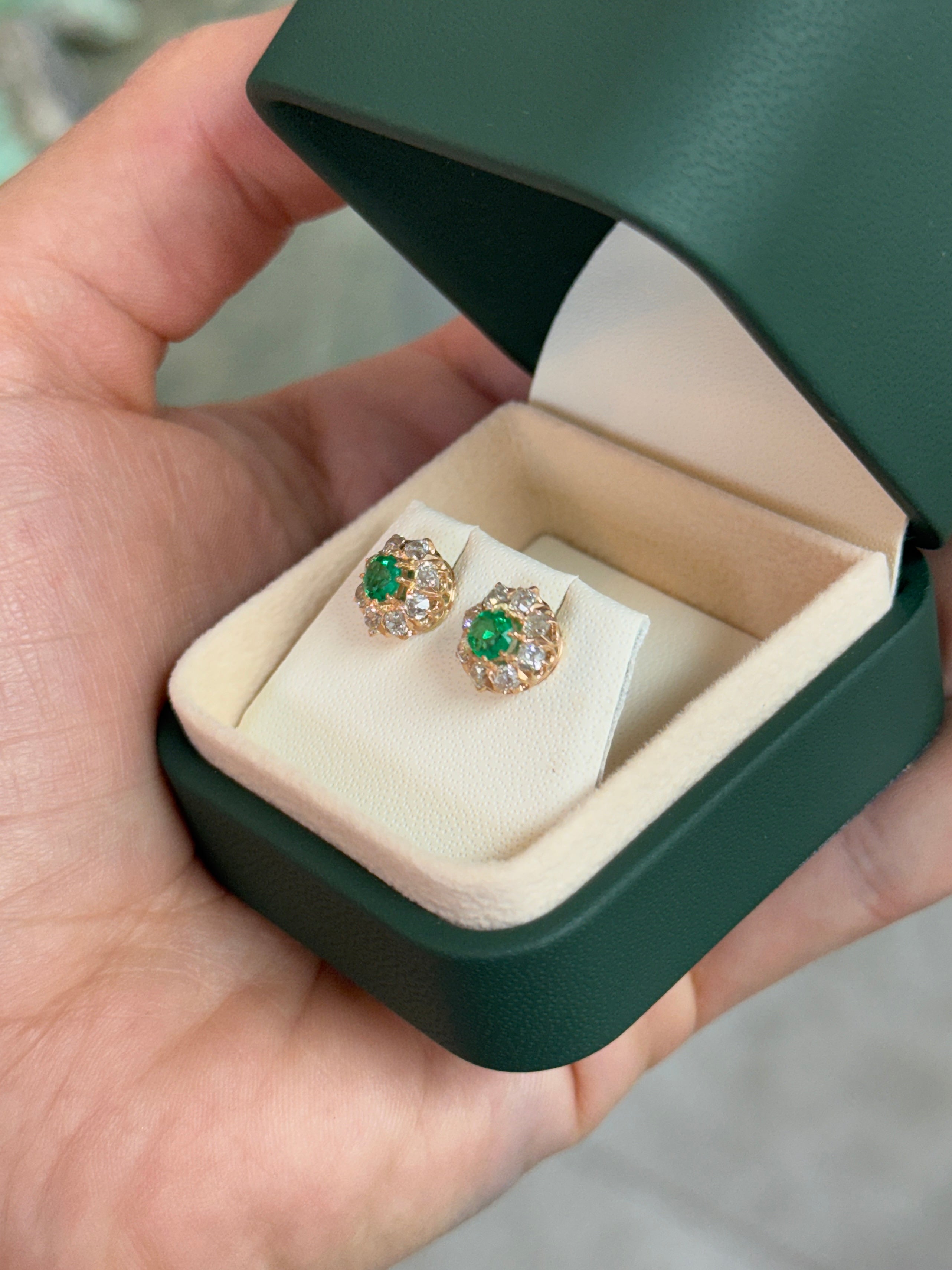 Vivid Colombian emerald halo stud earrings with Old European cut diamonds in 14K gold by JR Colombian Emeralds.