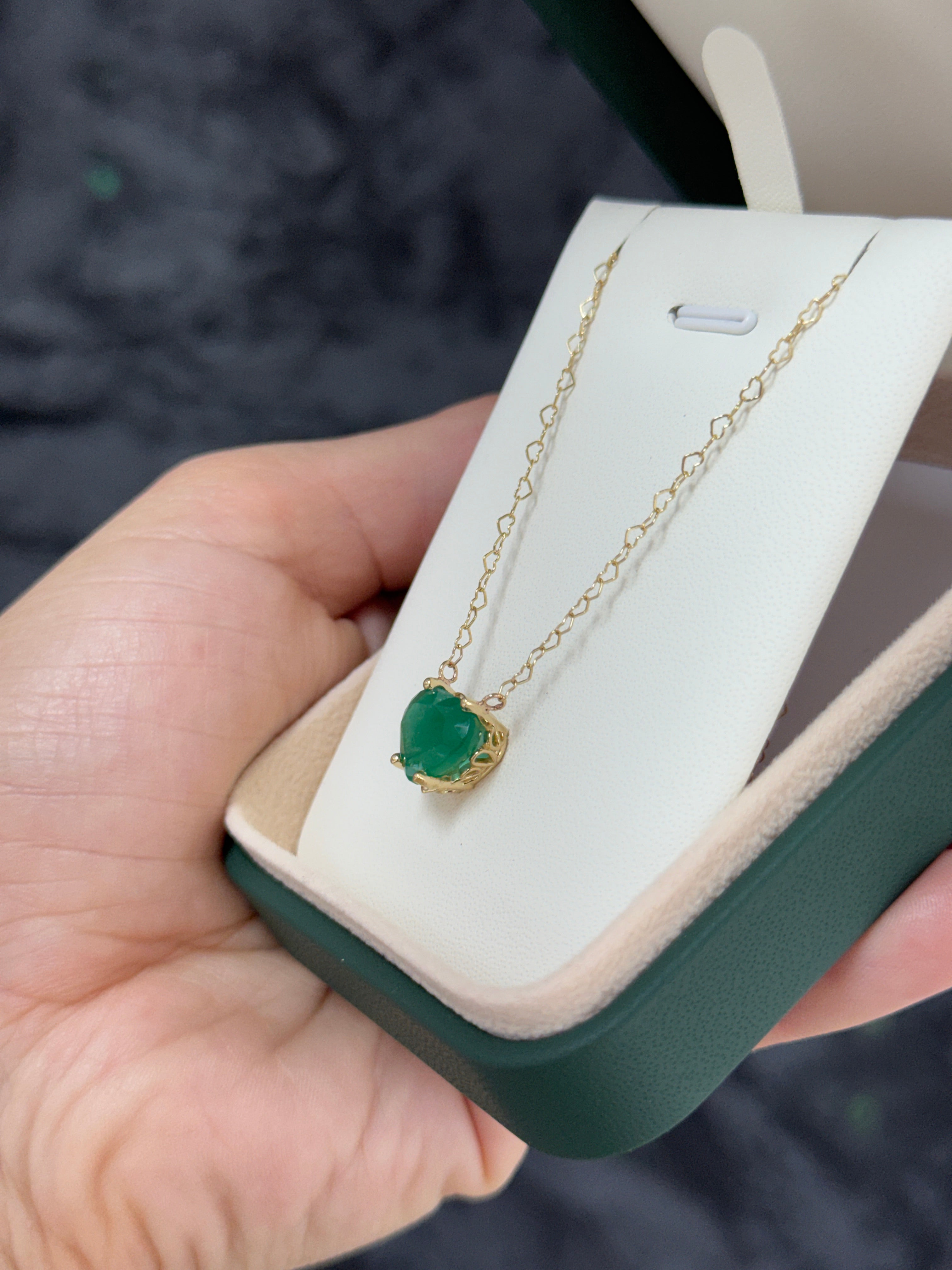 Natural Zambian emerald heart-shaped solitaire necklace with a delicate chain, featuring a 4.07-carat emerald from JR Colombian Emeralds.