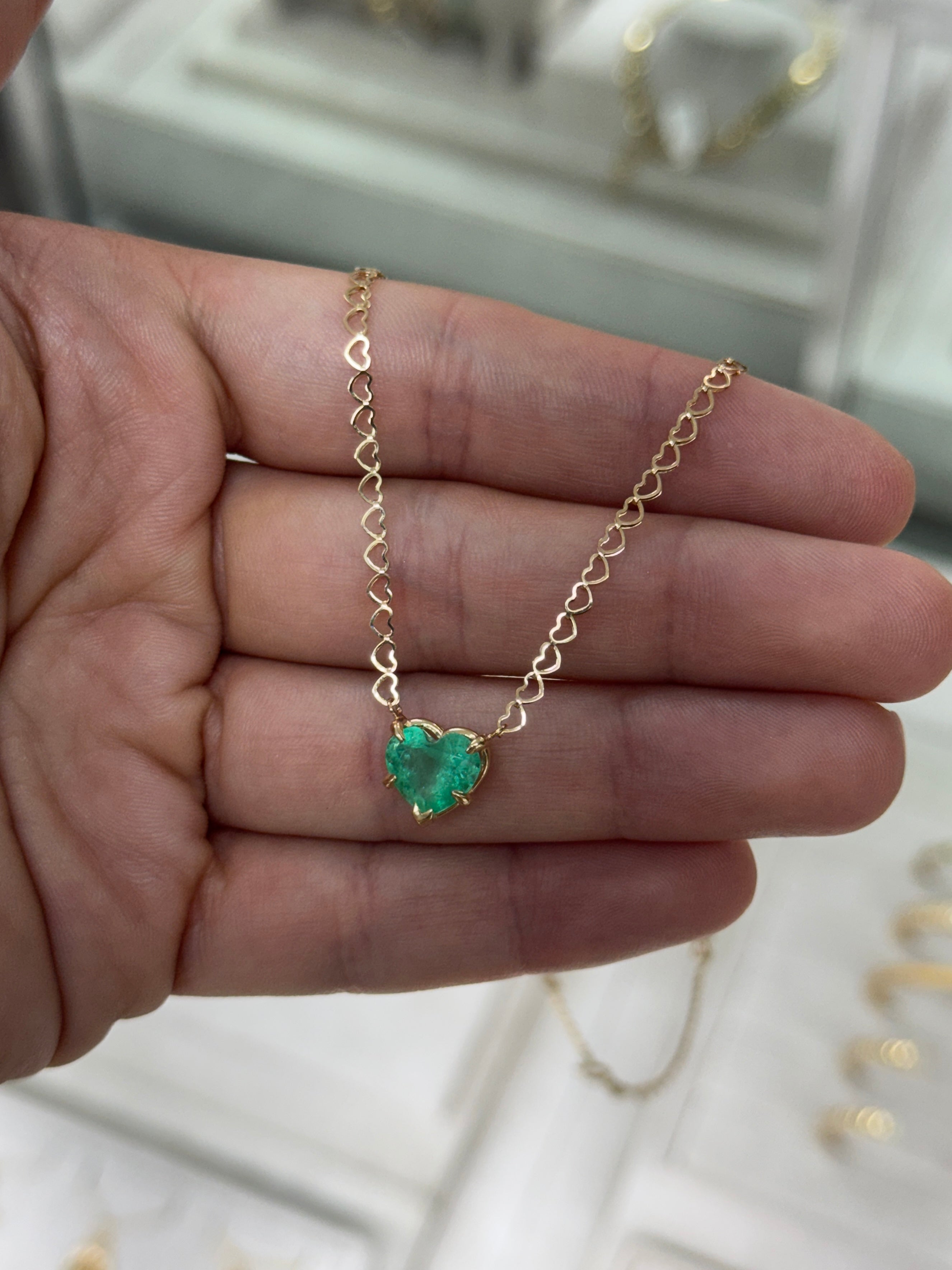 Natural Colombian emerald heart-shaped solitaire necklace in 14K gold with a 2.70-carat emerald, featuring a stationary pendant.