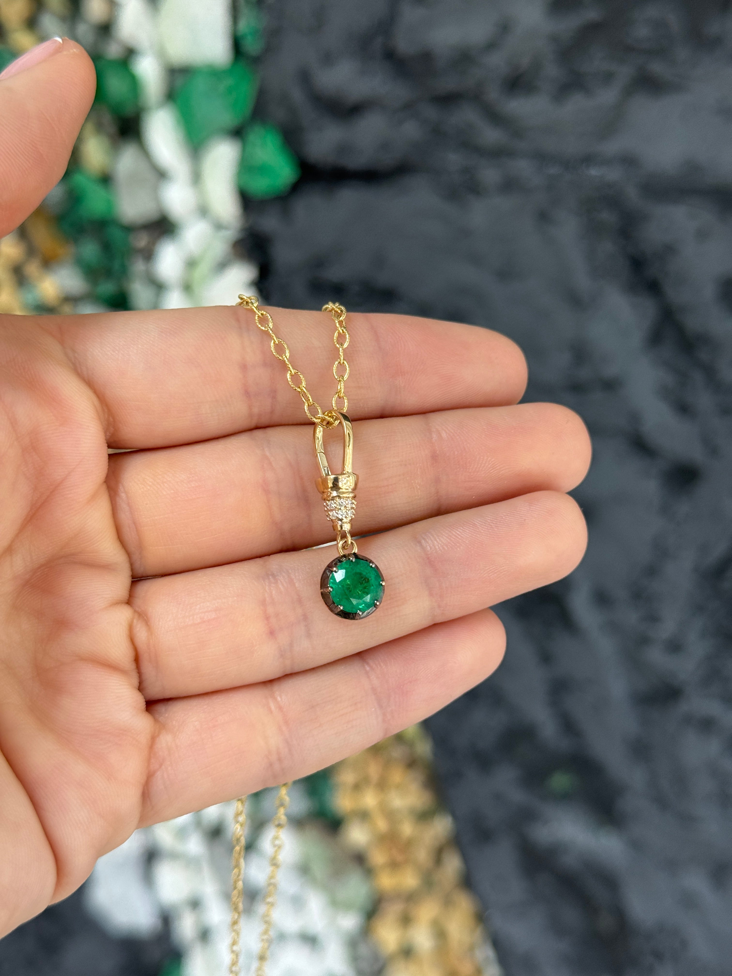14K gold emerald pendant necklace with round cut gemstone, diamond accents, and multi-prong setting from JR Colombian Emeralds.