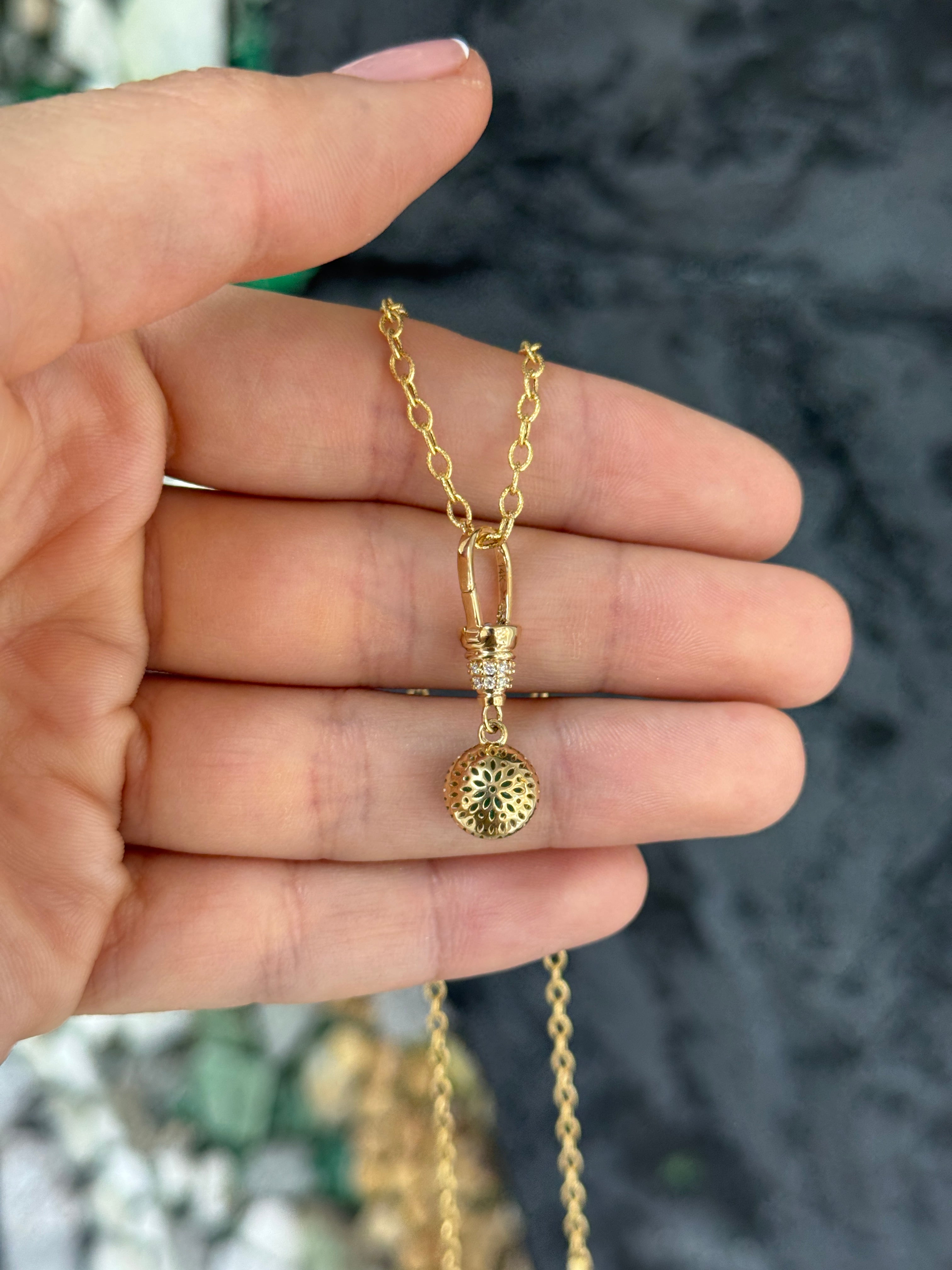 14K gold emerald pendant necklace with round cut gemstone, multi-prong setting, and diamond accents, from JR Colombian Emeralds.