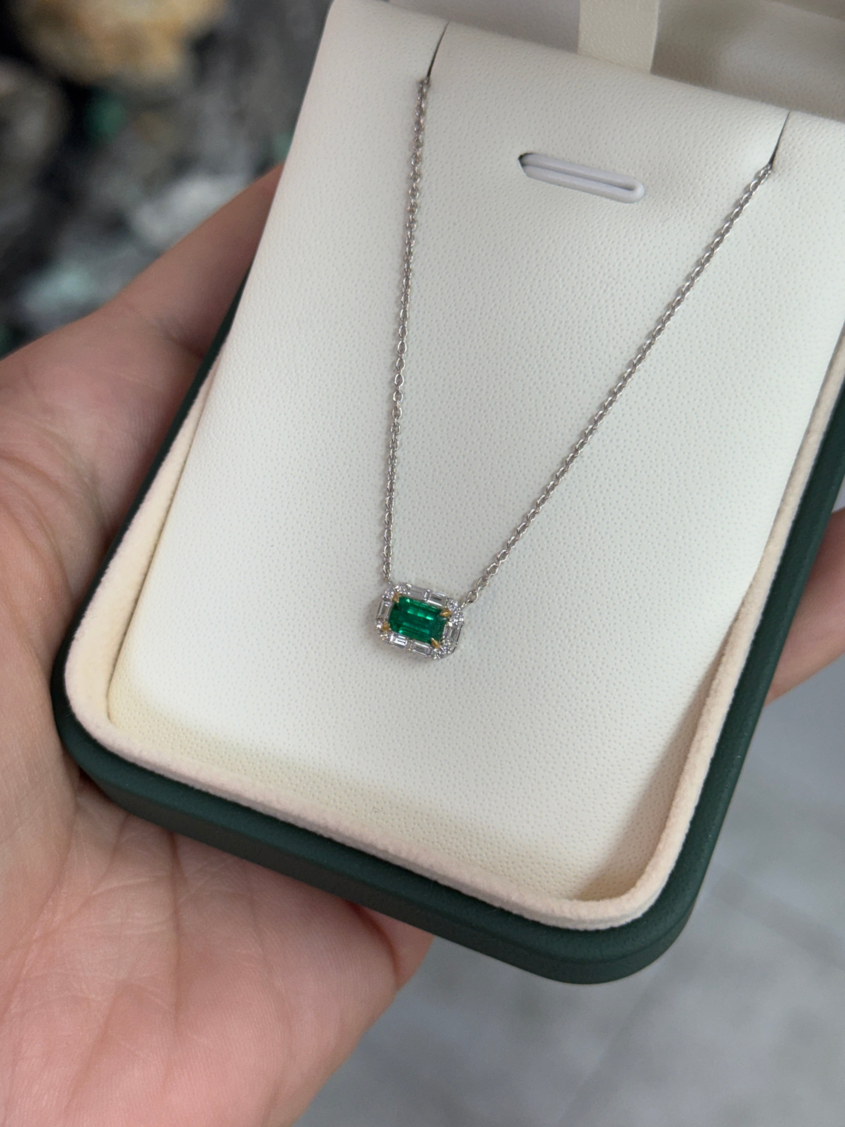 AAA+ natural emerald and baguette diamond halo east-west stationary necklace in 18K gold by JR Colombian Emeralds.