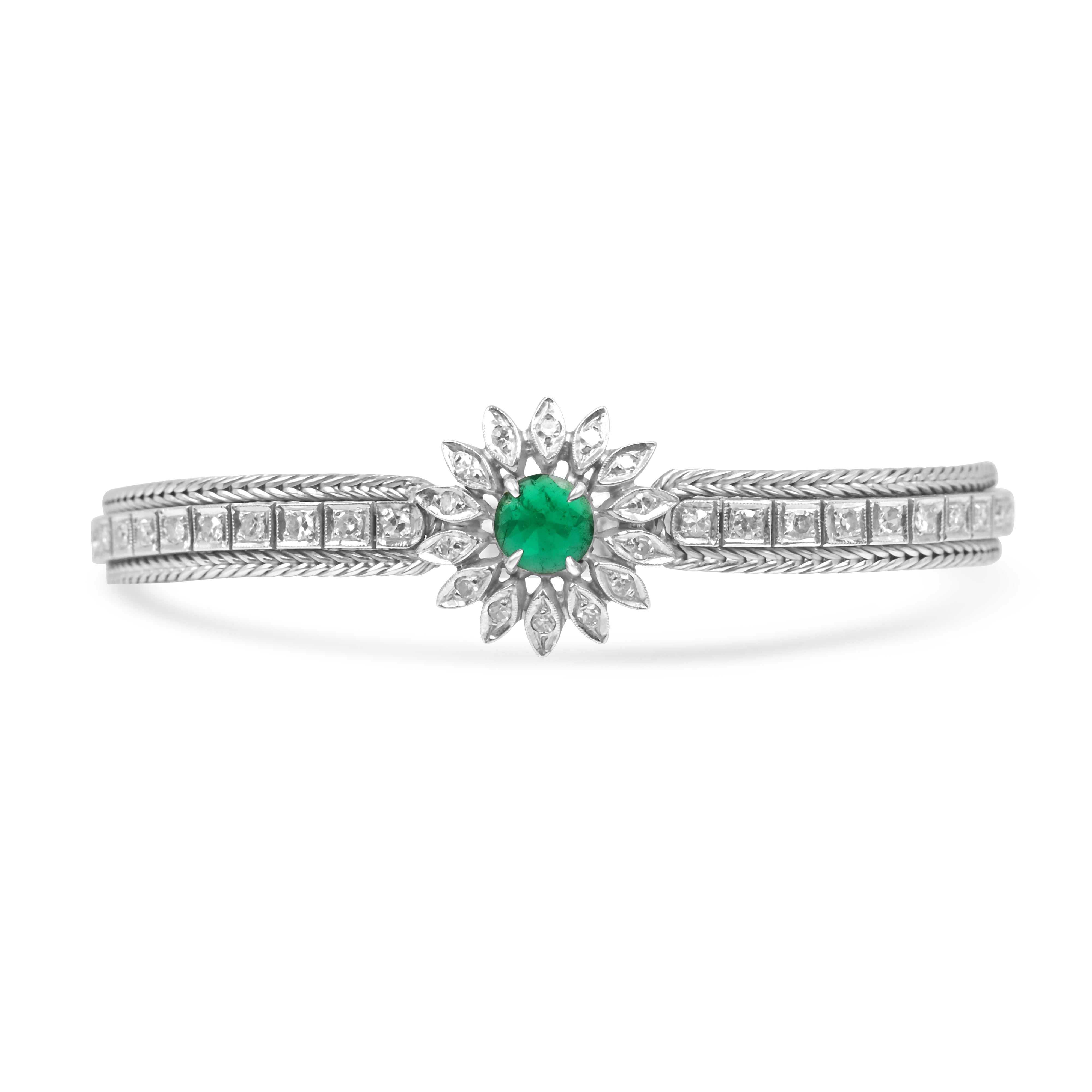 Vintage 1920s Colombian emerald and diamond floral bangle bracelet in 14K white gold