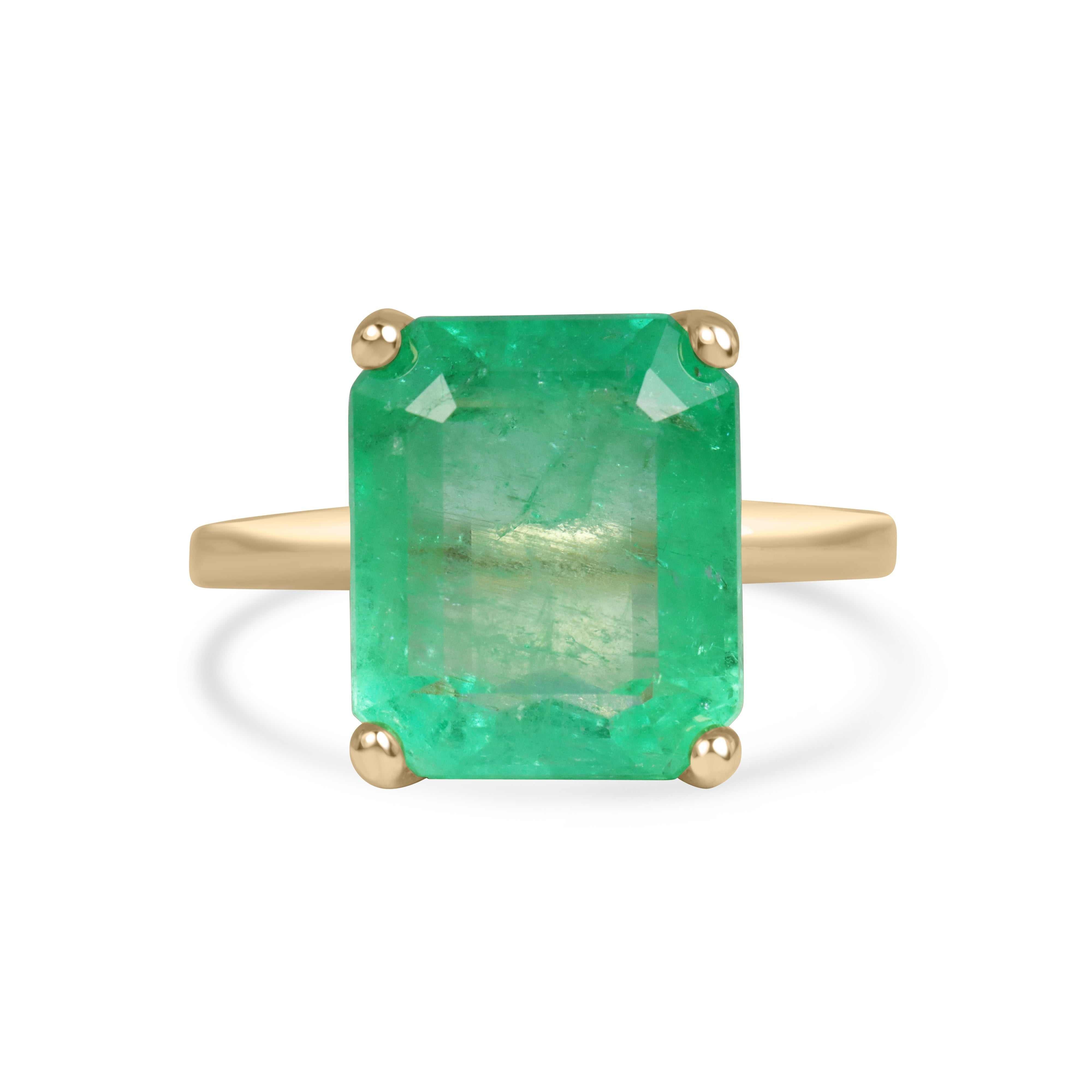 6.85 carat large yellowish green Colombian emerald solitaire ring in 14K gold