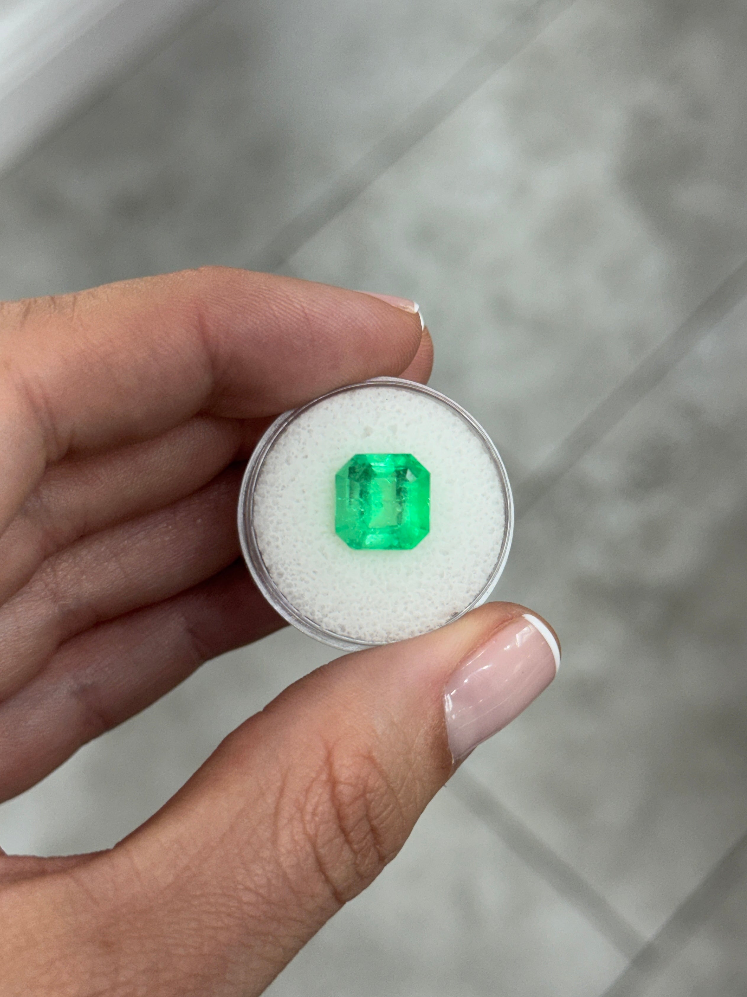 4.57 carat 10x10mm loose Colombian emerald Asscher cut with clipped corners, glowing green gemstone by JR Colombian Emeralds