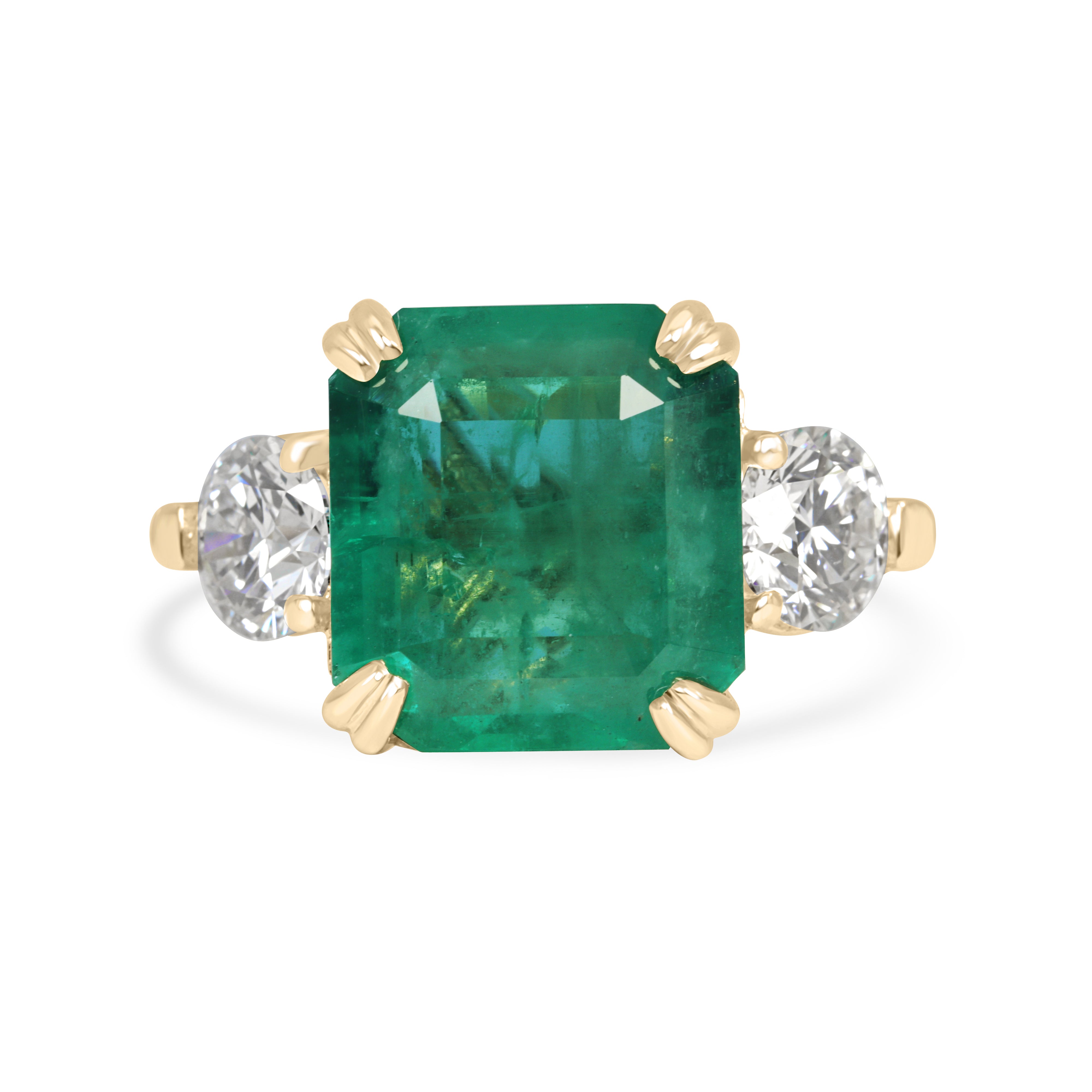 Three stone Asscher cut emerald engagement ring with round lab diamonds in 14K gold cathedral setting by JR Colombian Emeralds.