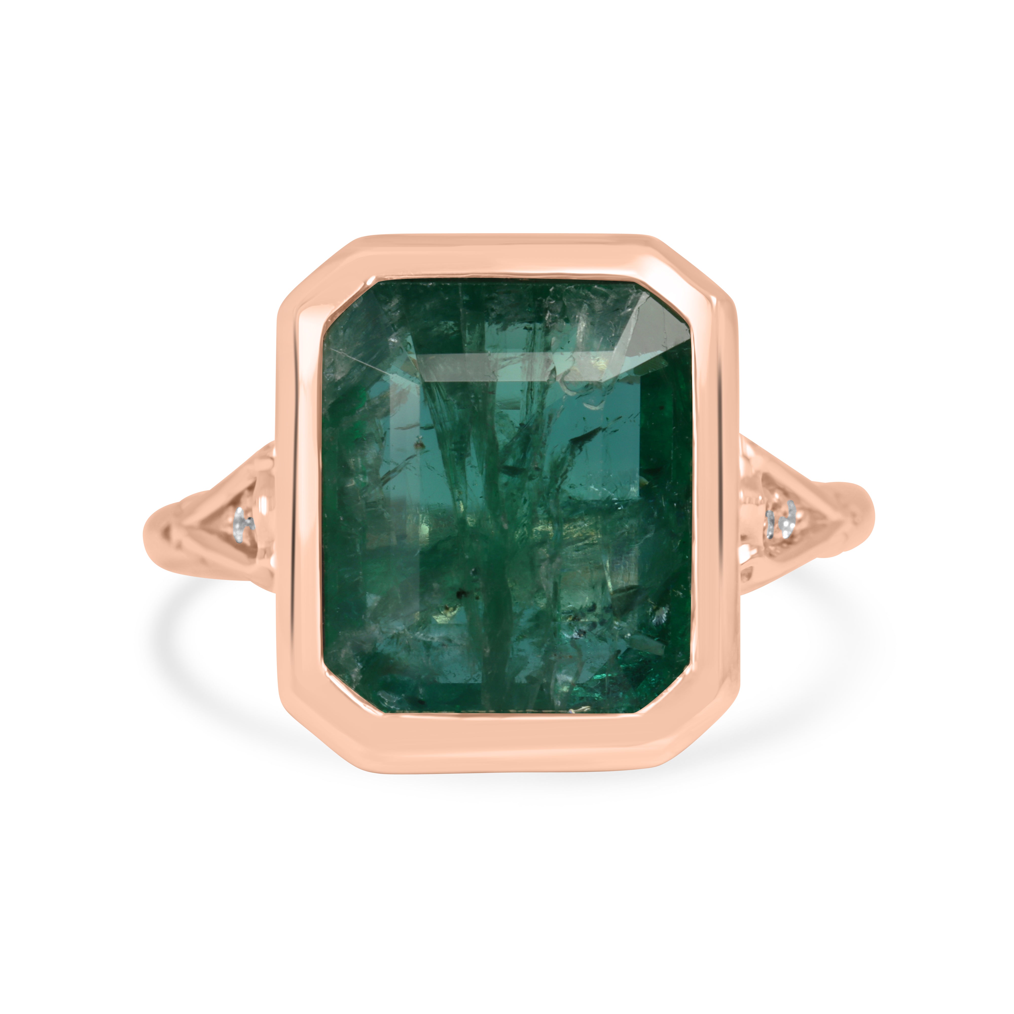 Vintage-inspired 14K rose gold emerald bezel ring with diamond shank and scroll basket detail by JR Colombian Emeralds.