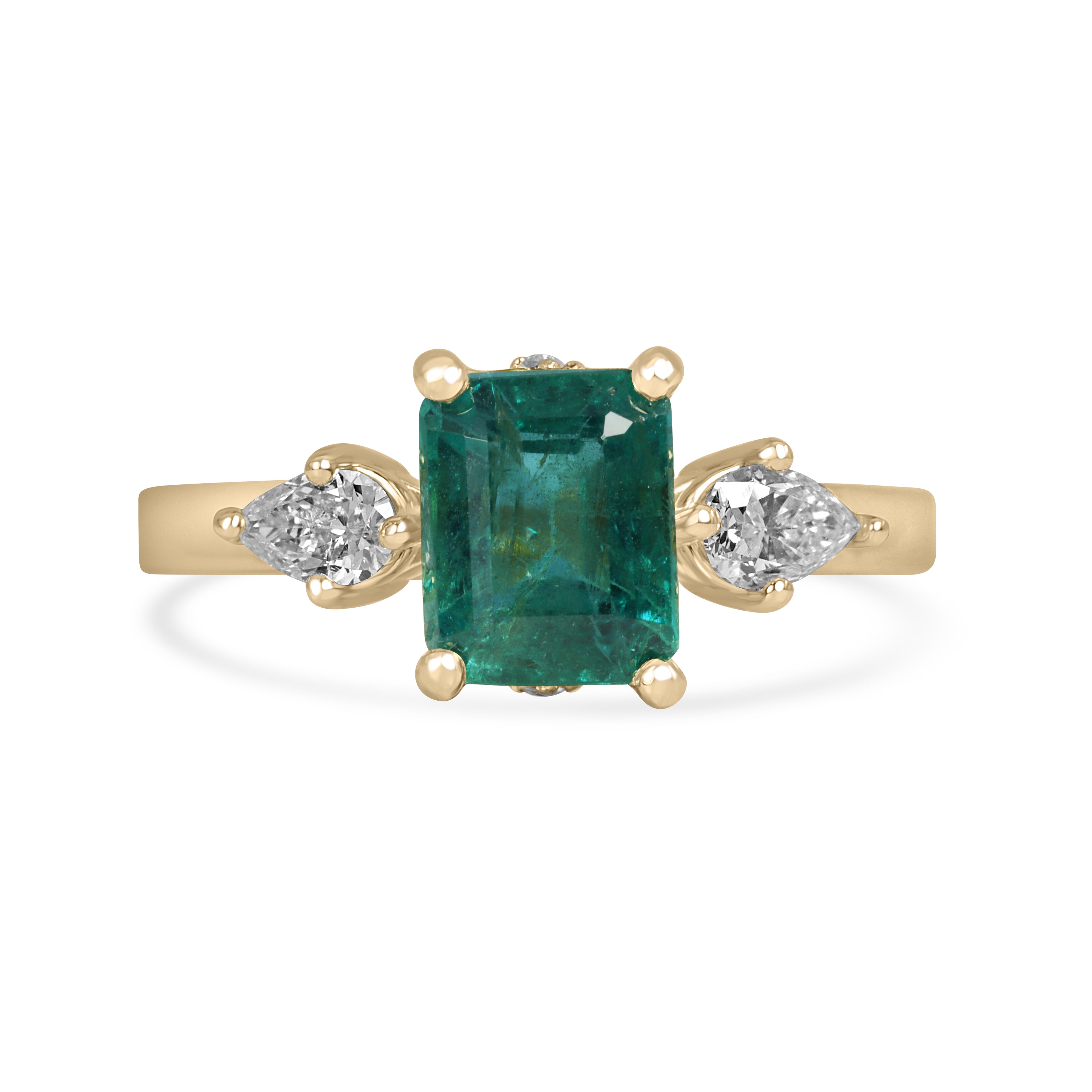 Emerald cut and pear-shaped emerald diamond three-stone ring with hidden accent diamonds in 18K gold by JR Colombian Emeralds