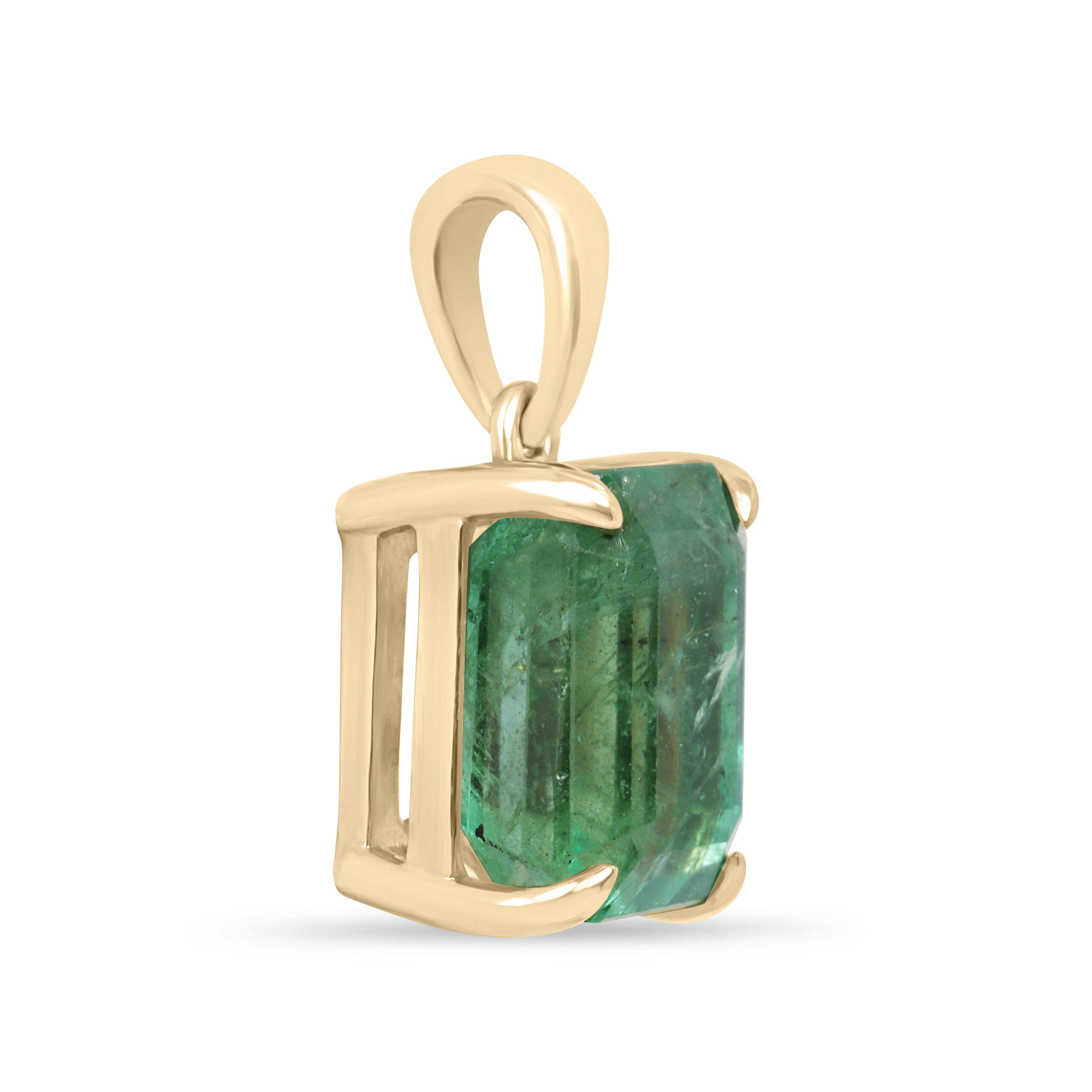 14K gold emerald necklace featuring a 4.25ct natural Colombian emerald solitaire, showcasing an earthy, vibrant green gemstone.