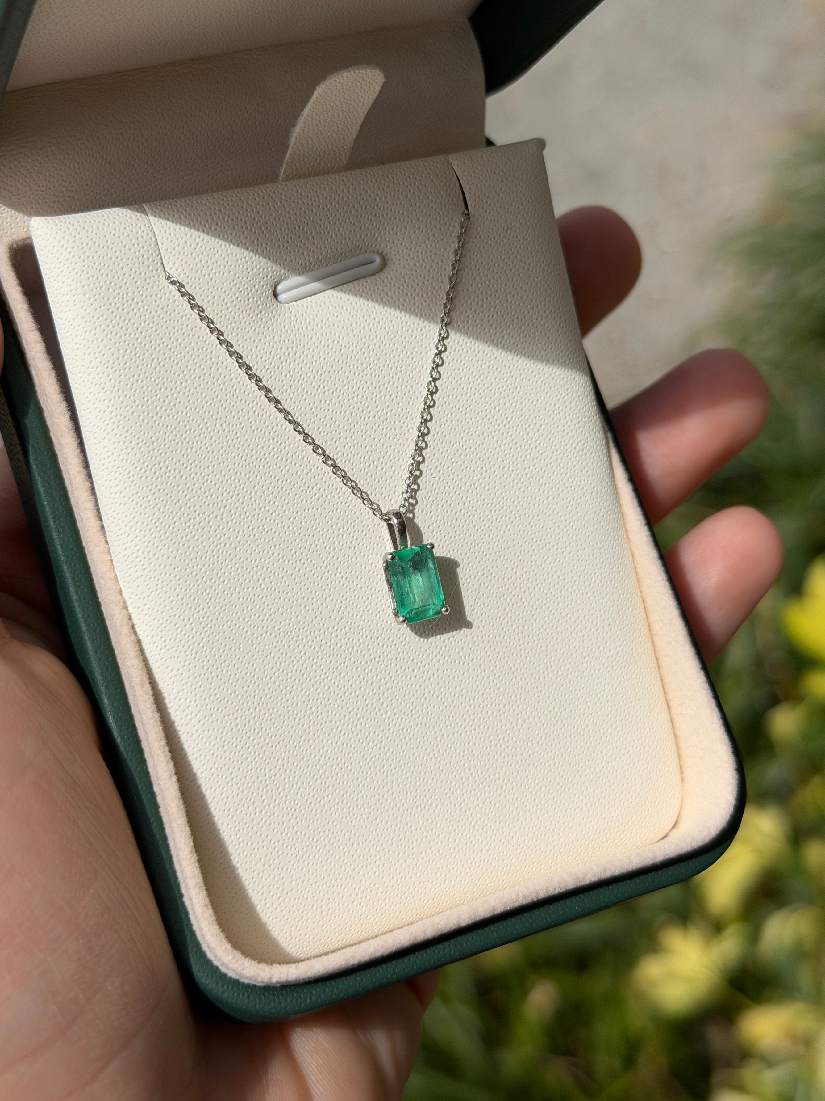 14K white gold Colombian emerald solitaire necklace featuring a 1.19 carat emerald gemstone, designed by JR Colombian Emeralds.