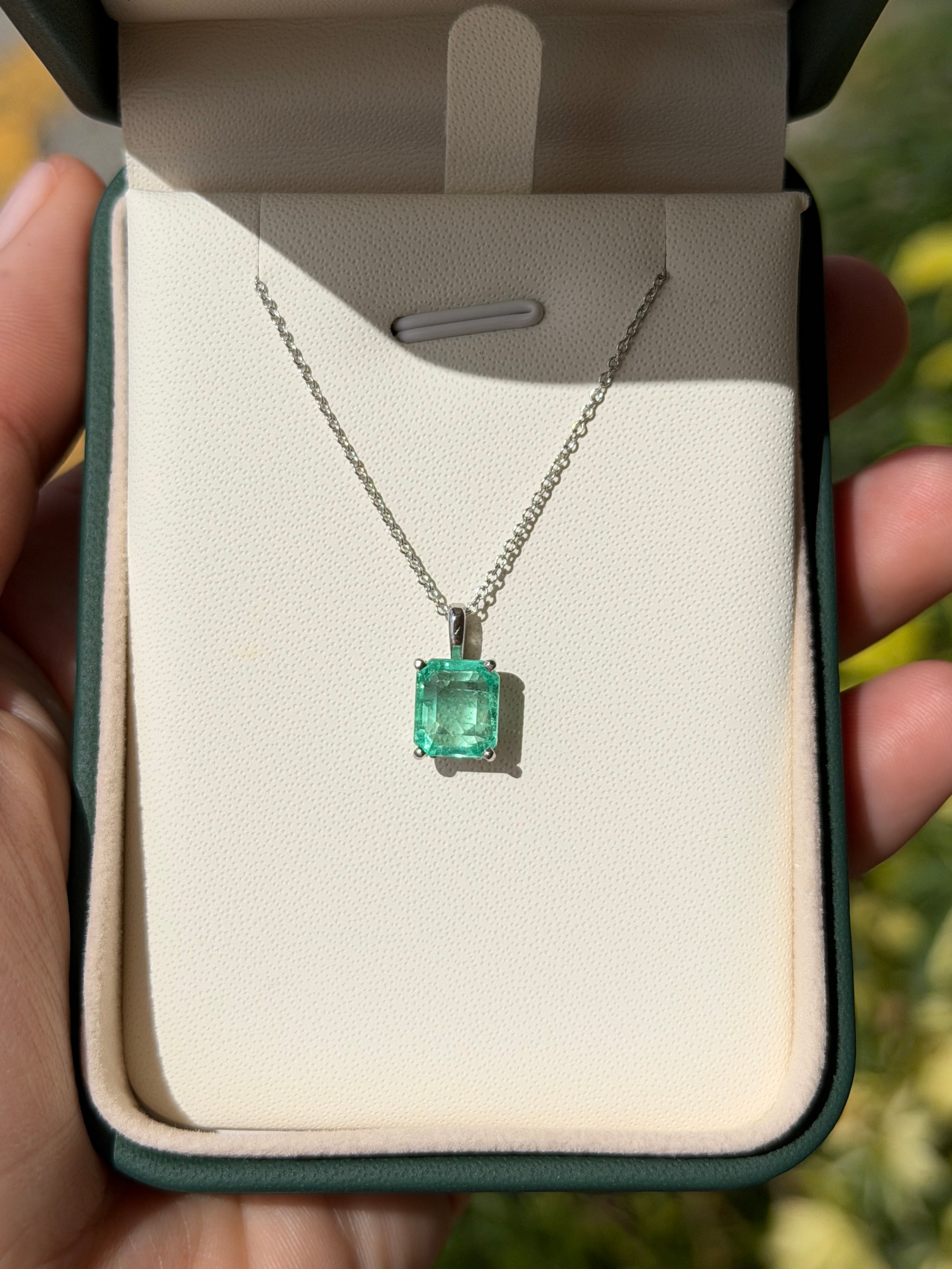 14K white gold Colombian emerald fleur de lis solitaire necklace with a 2.20 carat emerald by JR Colombian Emeralds.
