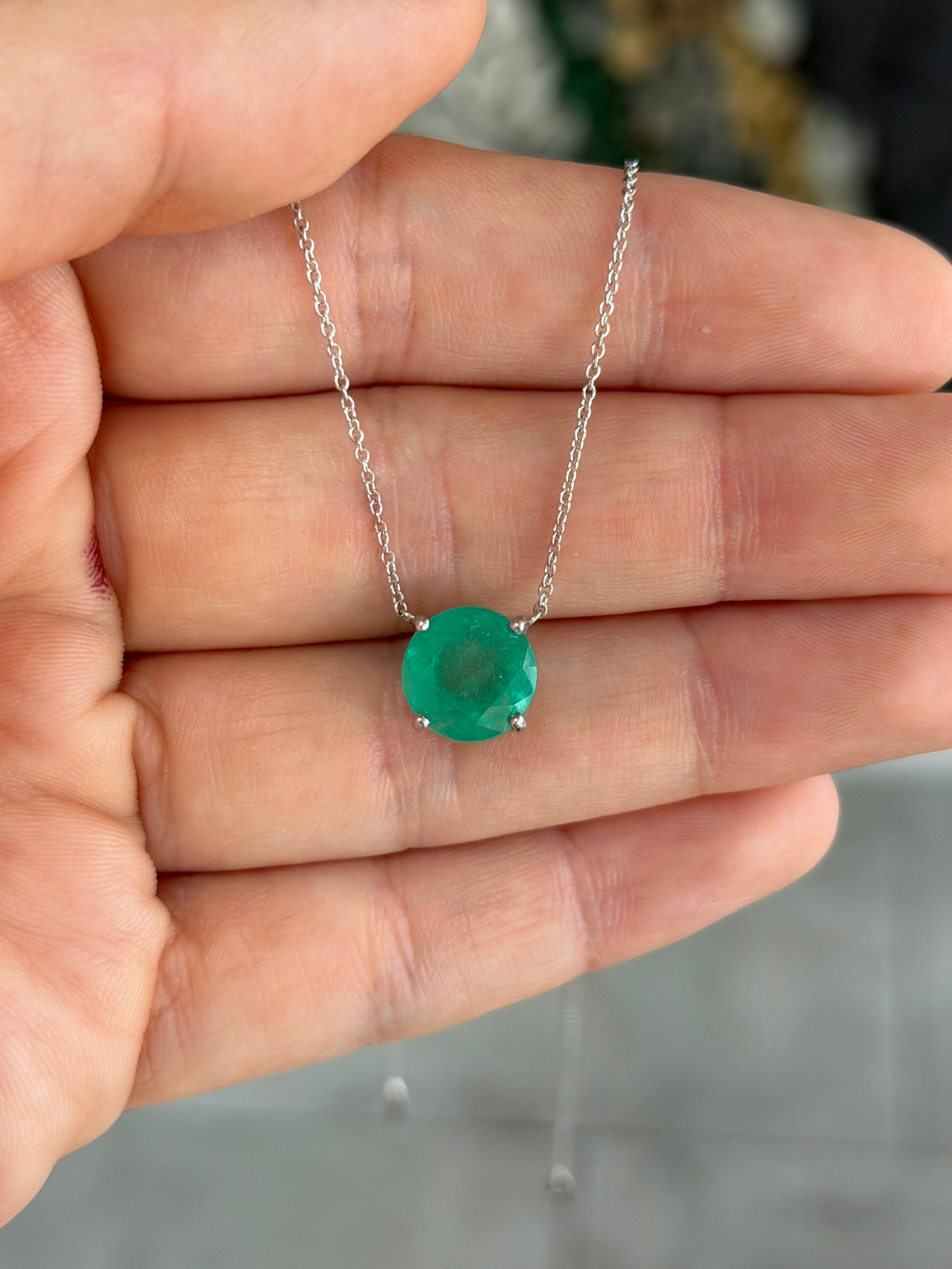 18K gold necklace featuring a 4.45ct round Colombian emerald, designed by JR Colombian Emeralds.
