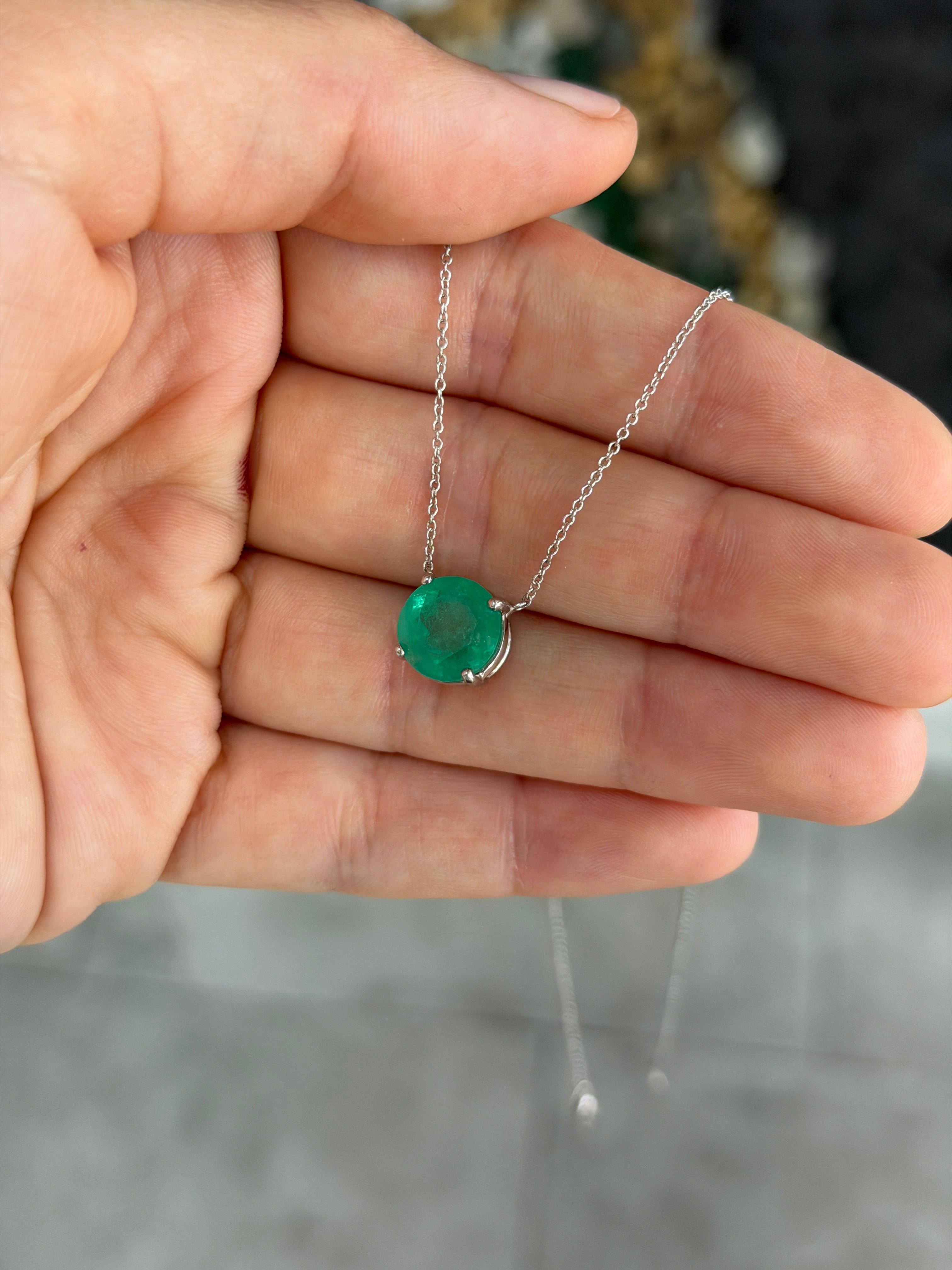 18K gold necklace featuring a 4.45ct round Colombian emerald in a stationary design by JR Colombian Emeralds.