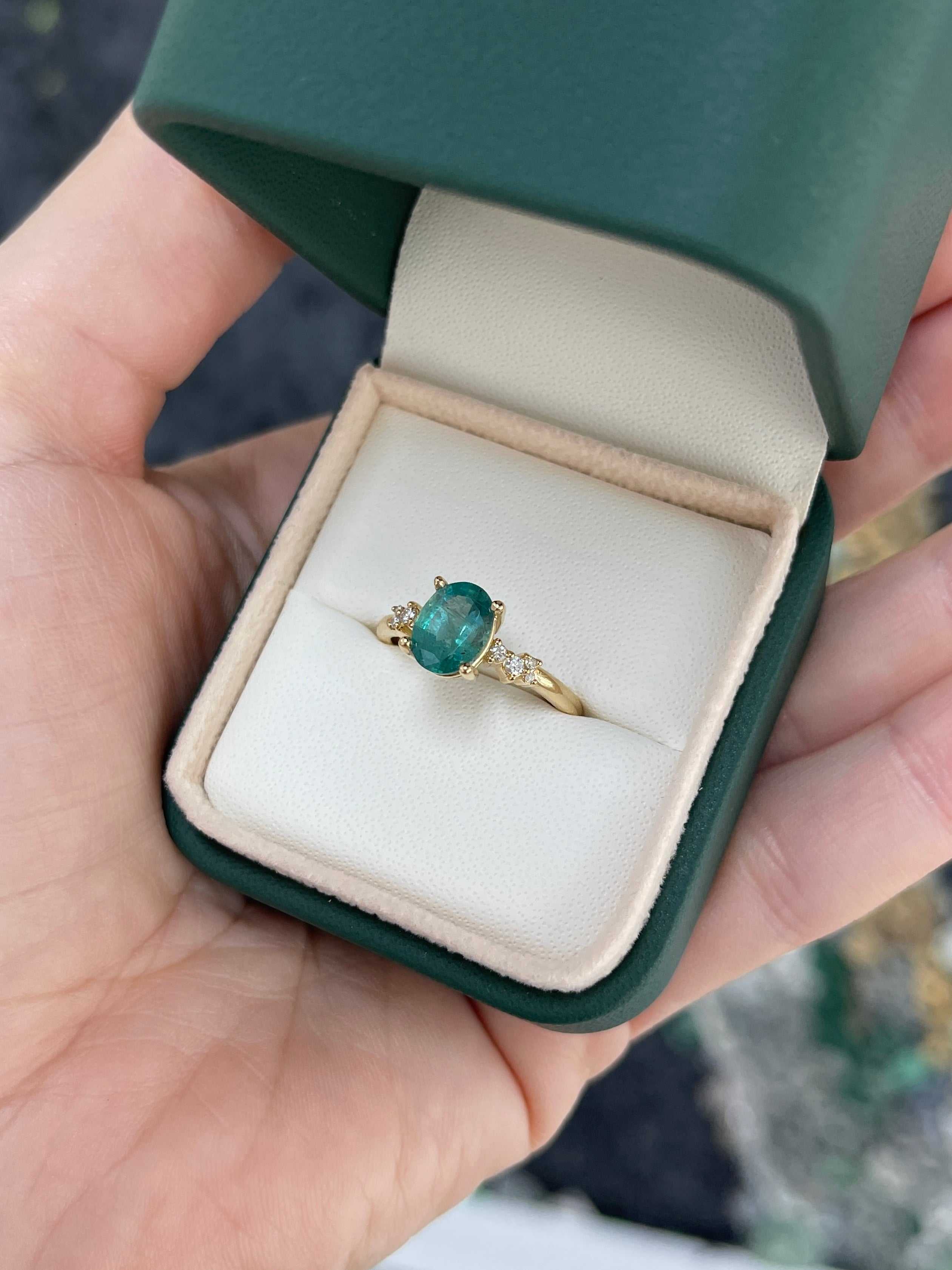 18K gold oval cut emerald and diamond constellation accent right hand ring with 1.41 carats total weight by JR Colombian Emeralds.