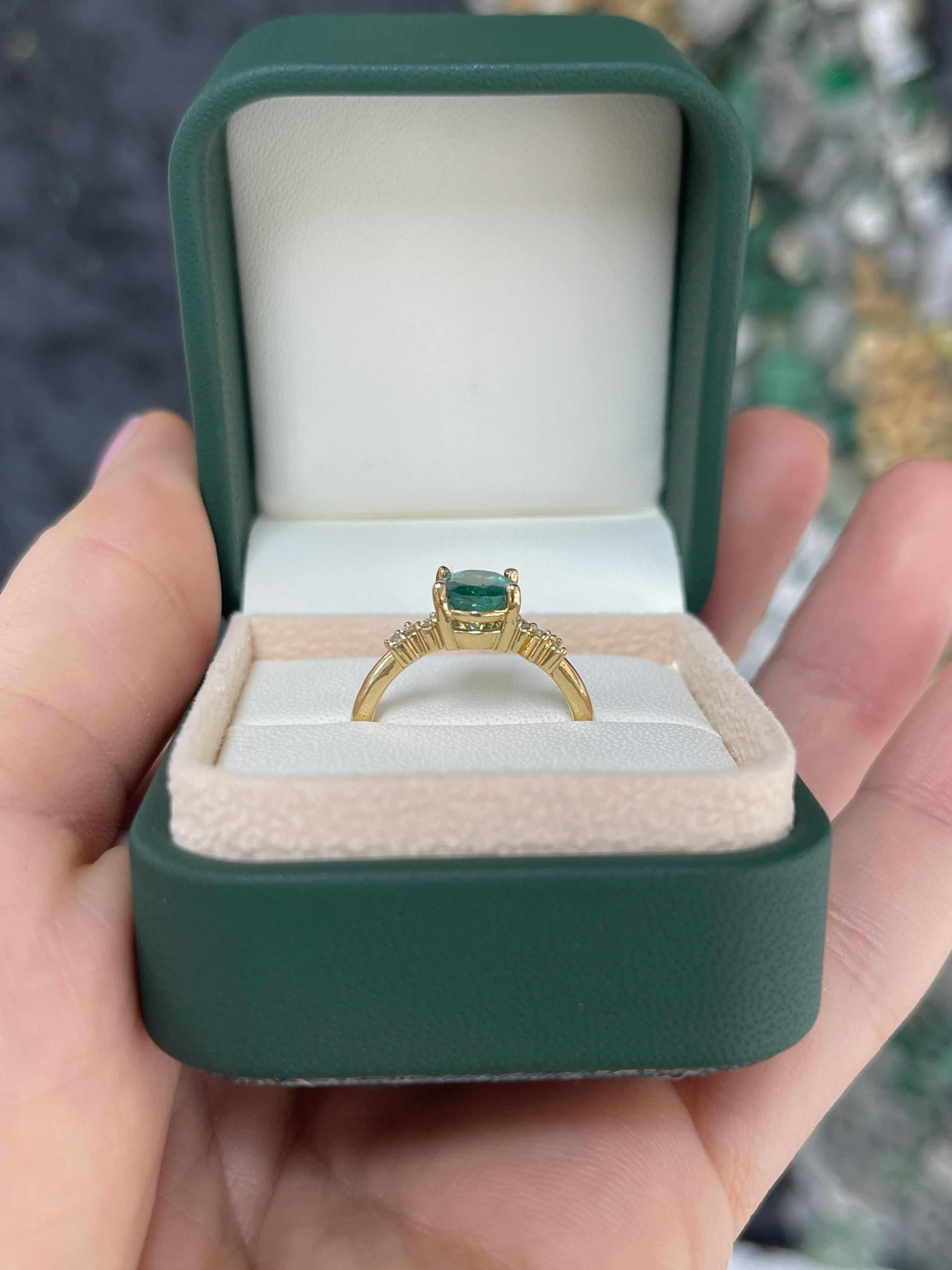 18K gold right hand ring with 1.41tcw oval emerald and diamond constellation accents, designed by JR Colombian Emeralds.