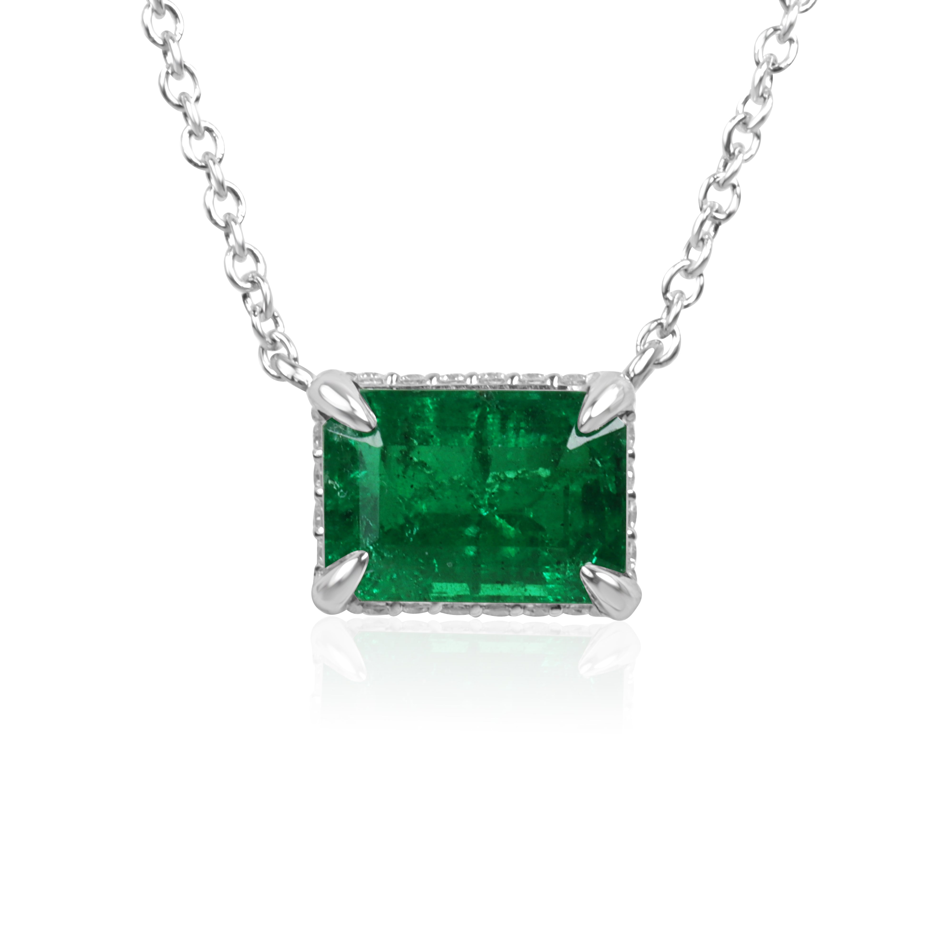 JR Colombian Emeralds 1.57tcw AAA natural E-W emerald pendant with hidden diamond halo on platinum station necklace.