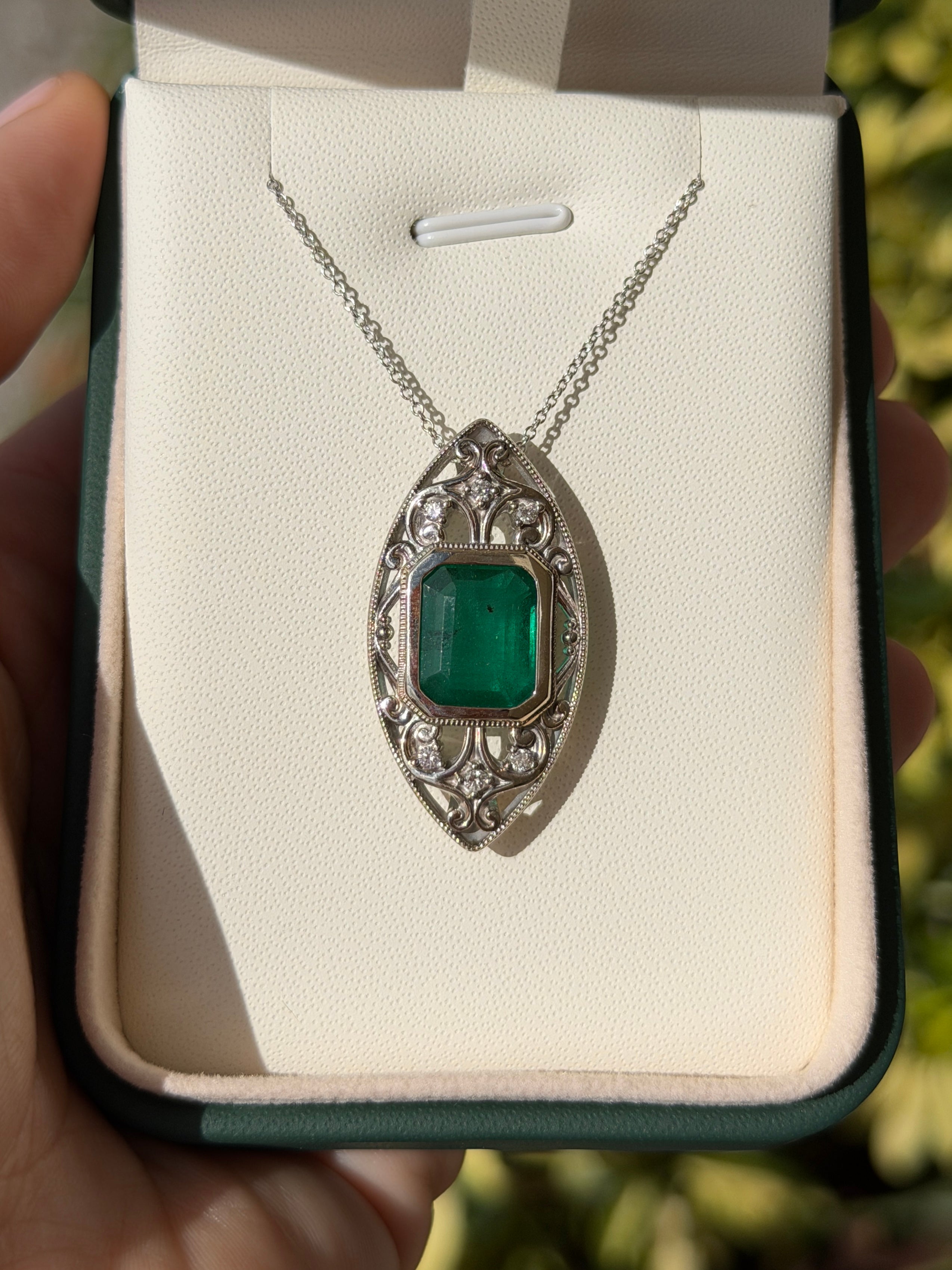 Art Deco-inspired emerald cut emerald and vintage filigree diamond slider necklace in 14K gold by JR Colombian Emeralds