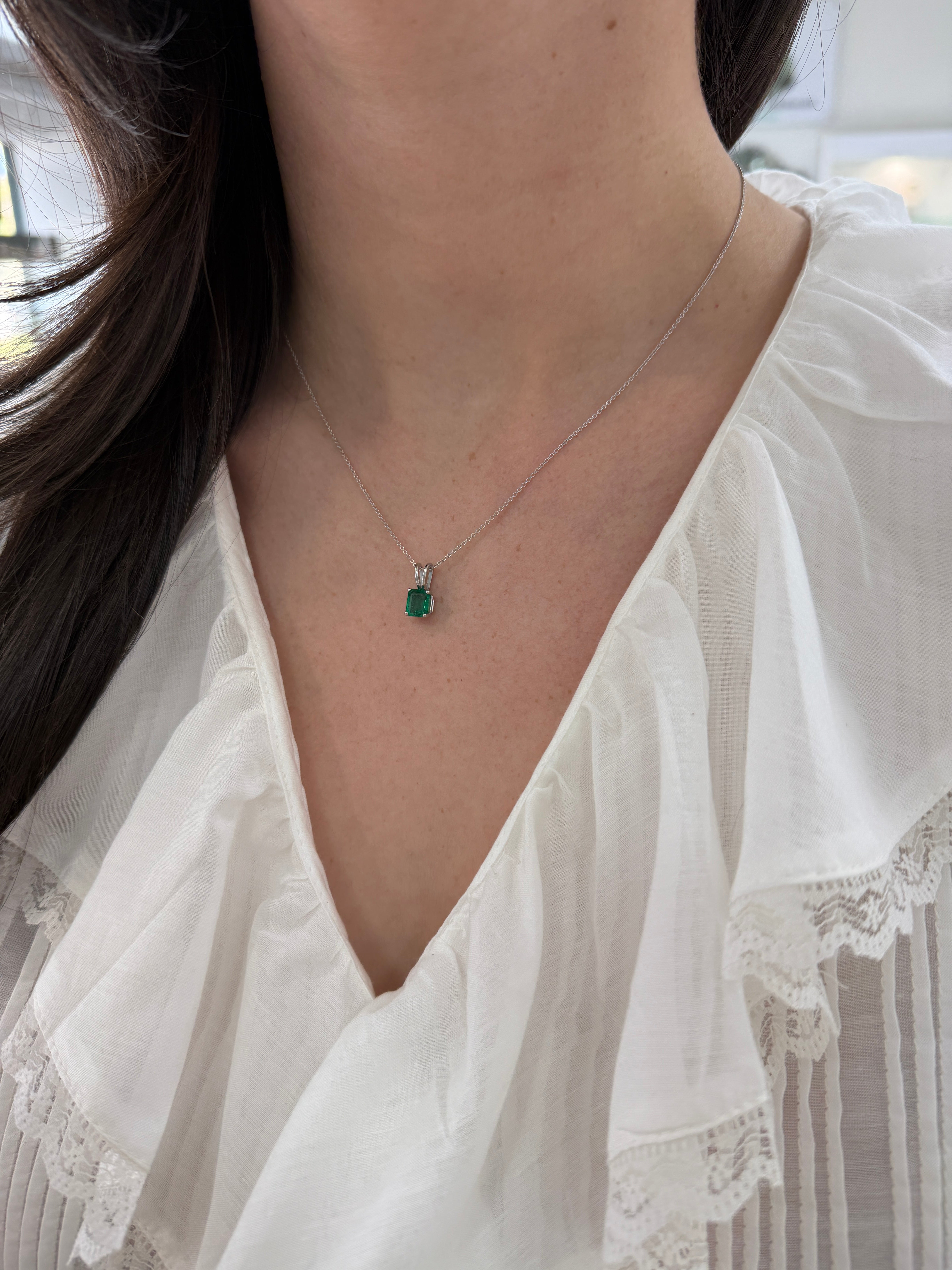 2.10ct platinum emerald solitaire necklace featuring a rich green Asscher cut emerald, from JR Colombian Emeralds.