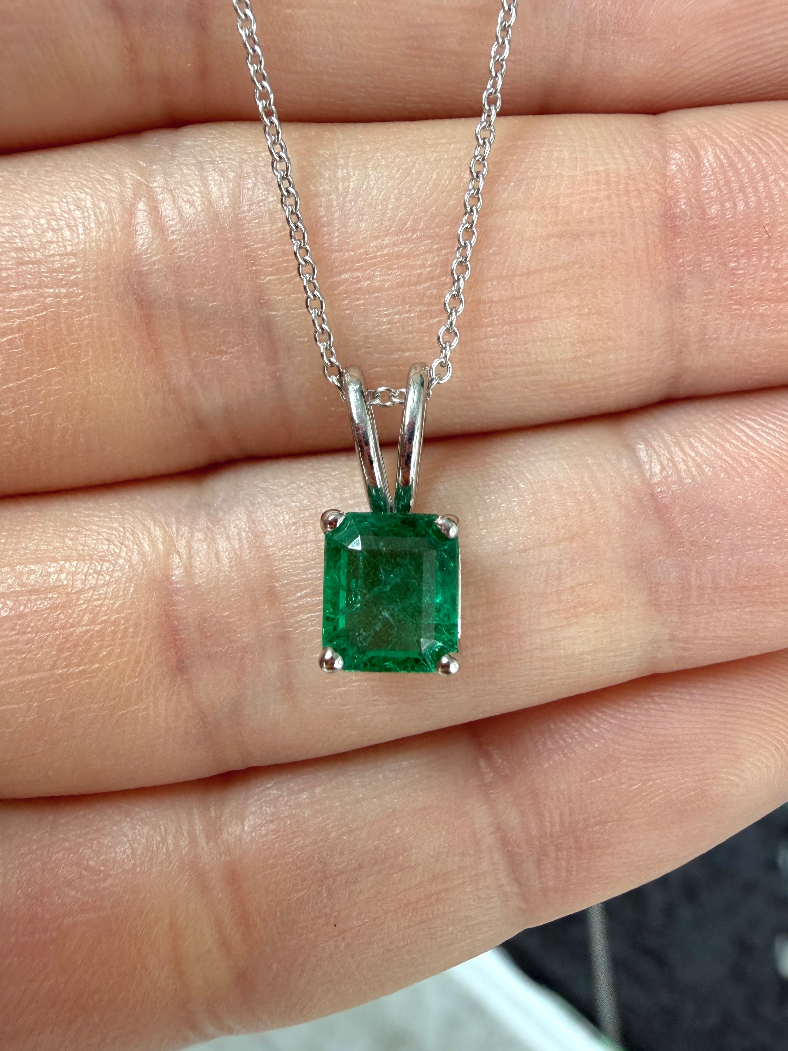 2.10ct platinum emerald solitaire necklace featuring a rich green Asscher cut emerald, crafted by JR Colombian Emeralds.